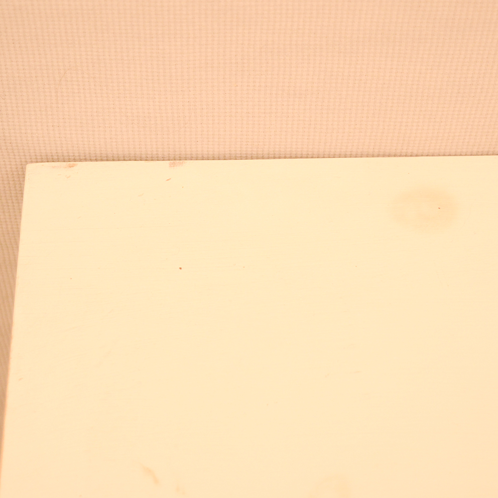 white wooden single pedestal desk