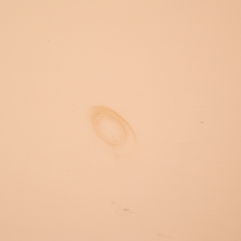 white wooden single pedestal desk