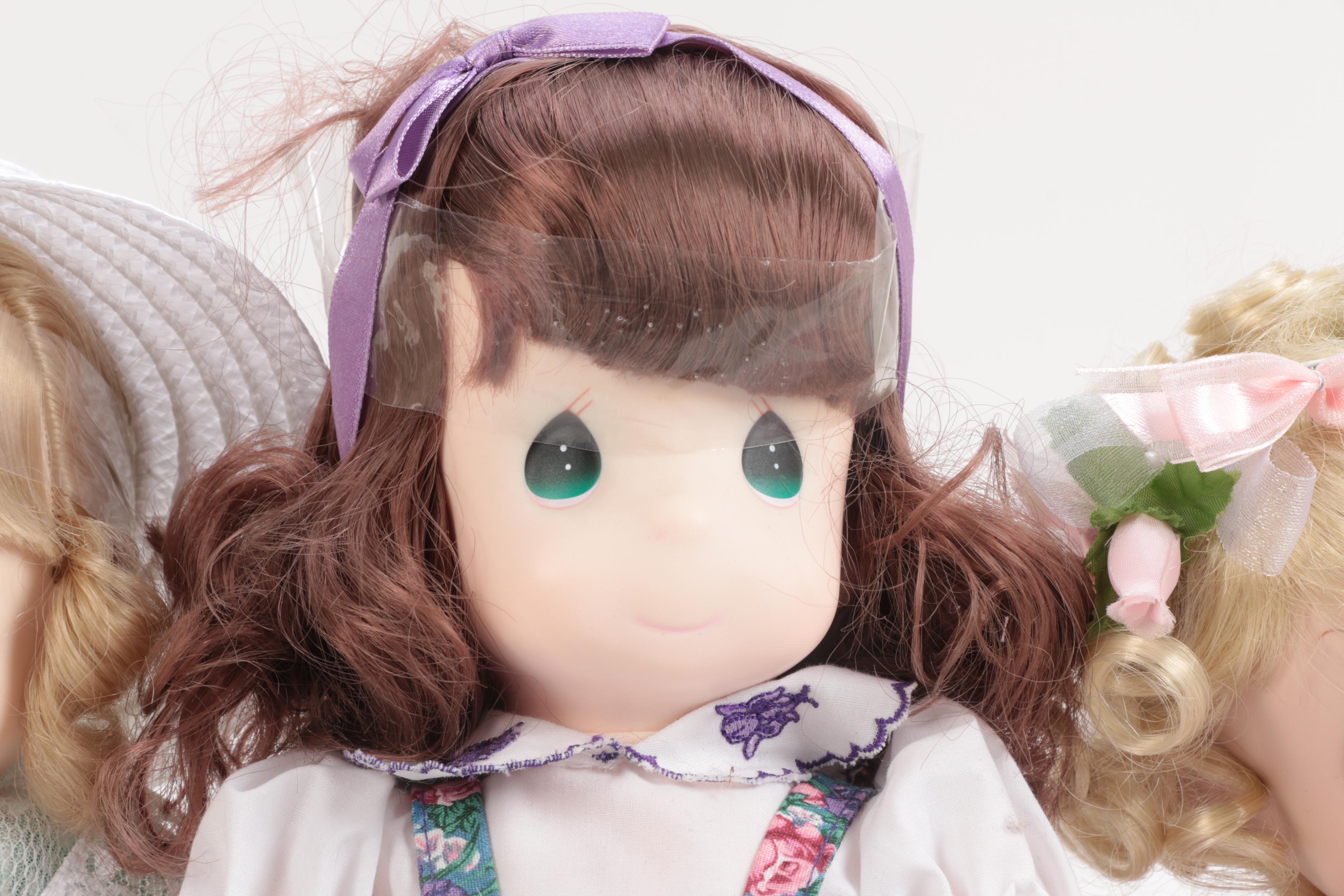 Generous Collection of Porcelain and Stuffed Dolls including Precious Moments