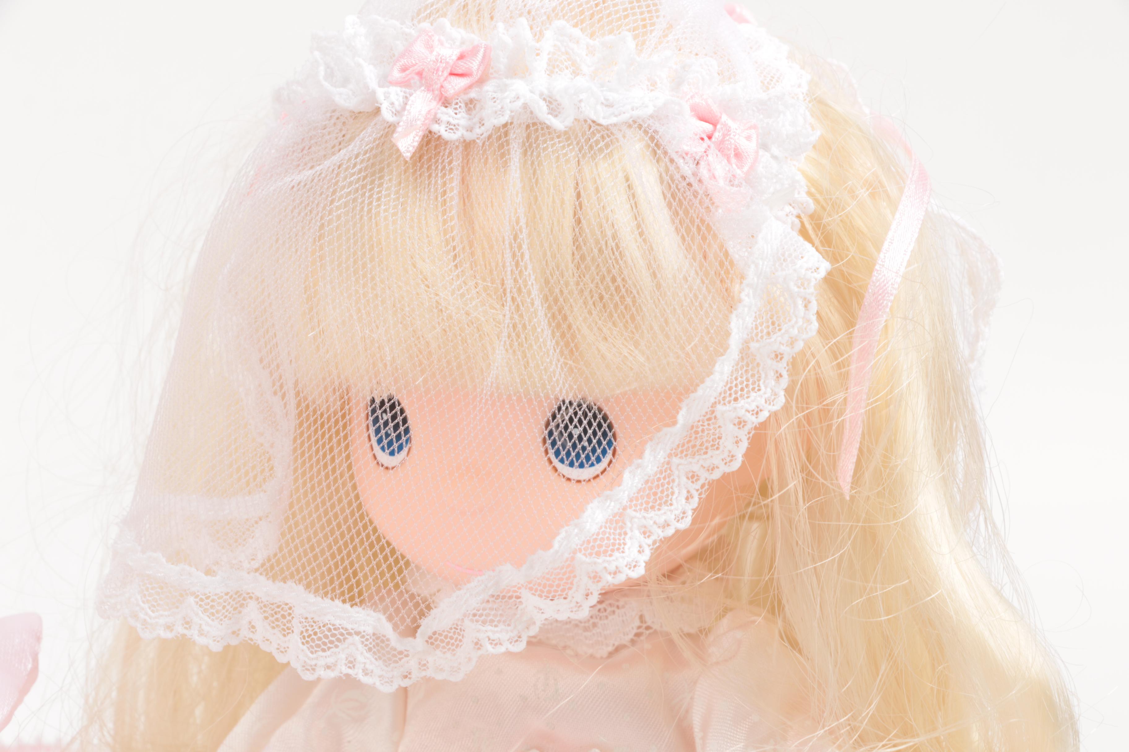 Generous Collection of Porcelain and Stuffed Dolls including Precious Moments