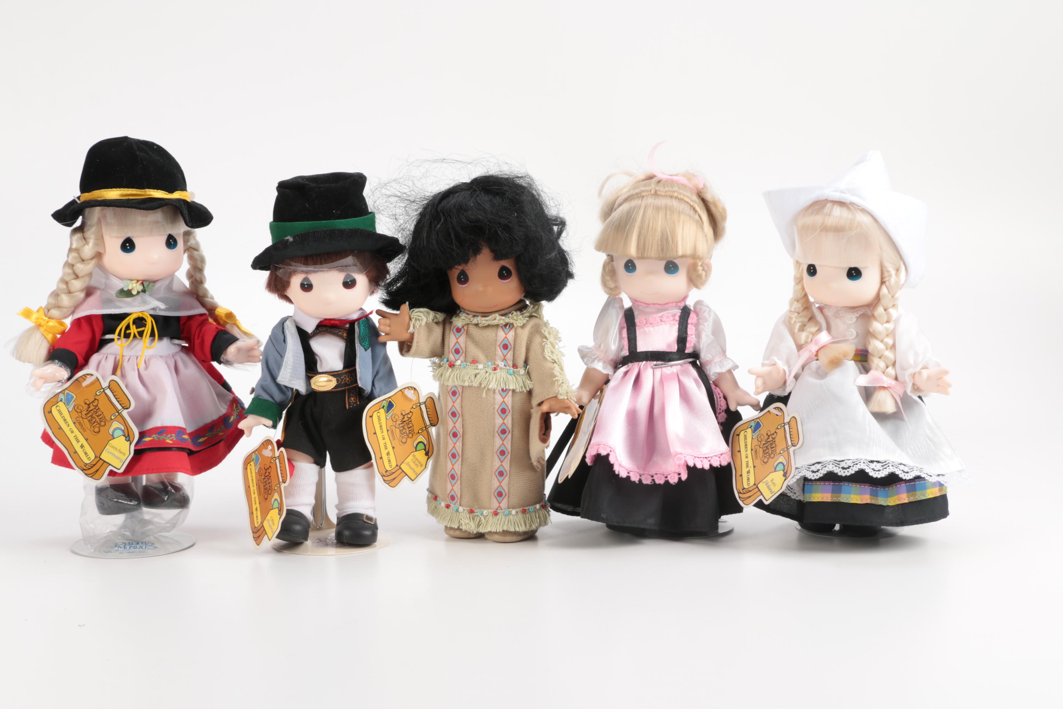 Generous Collection of Porcelain and Stuffed Dolls including Precious Moments