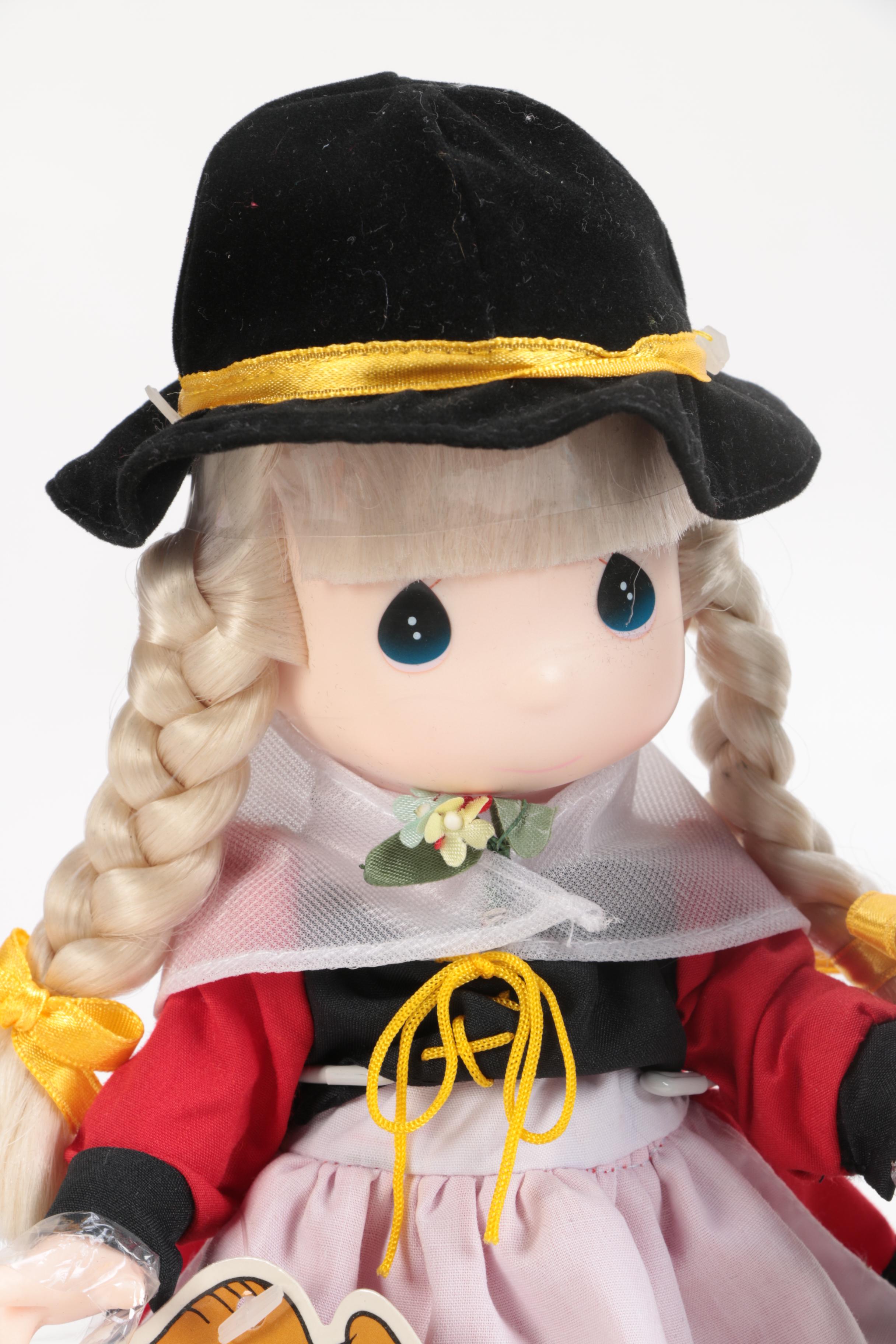 Generous Collection of Porcelain and Stuffed Dolls including Precious Moments