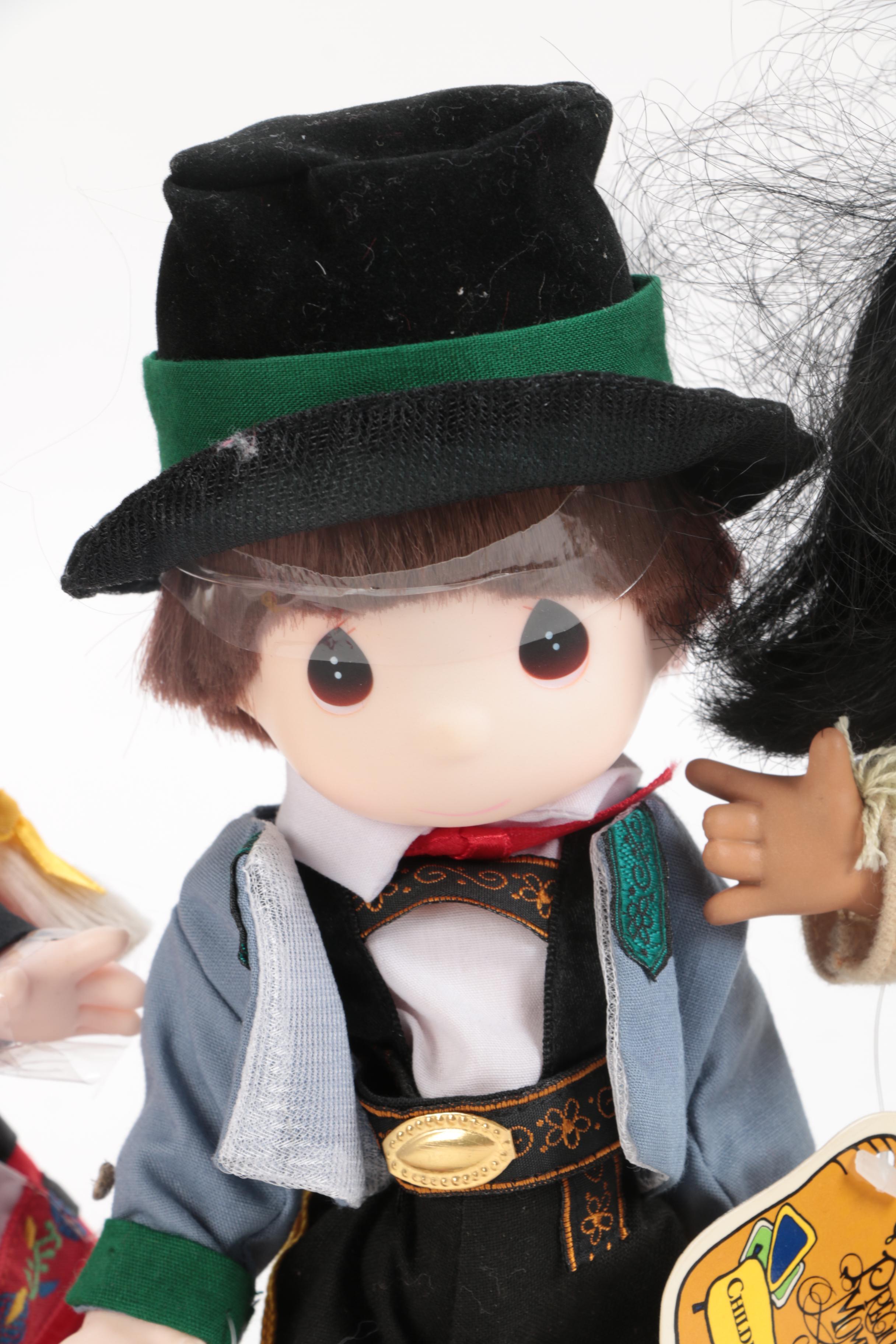 Generous Collection of Porcelain and Stuffed Dolls including Precious Moments