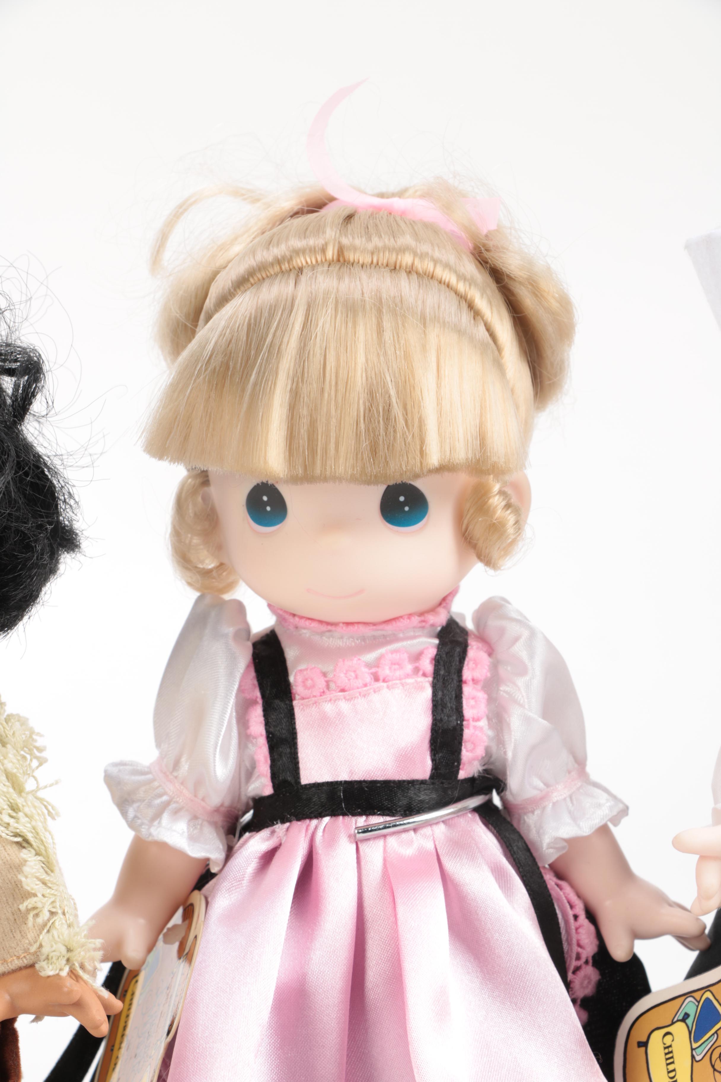 Generous Collection of Porcelain and Stuffed Dolls including Precious Moments