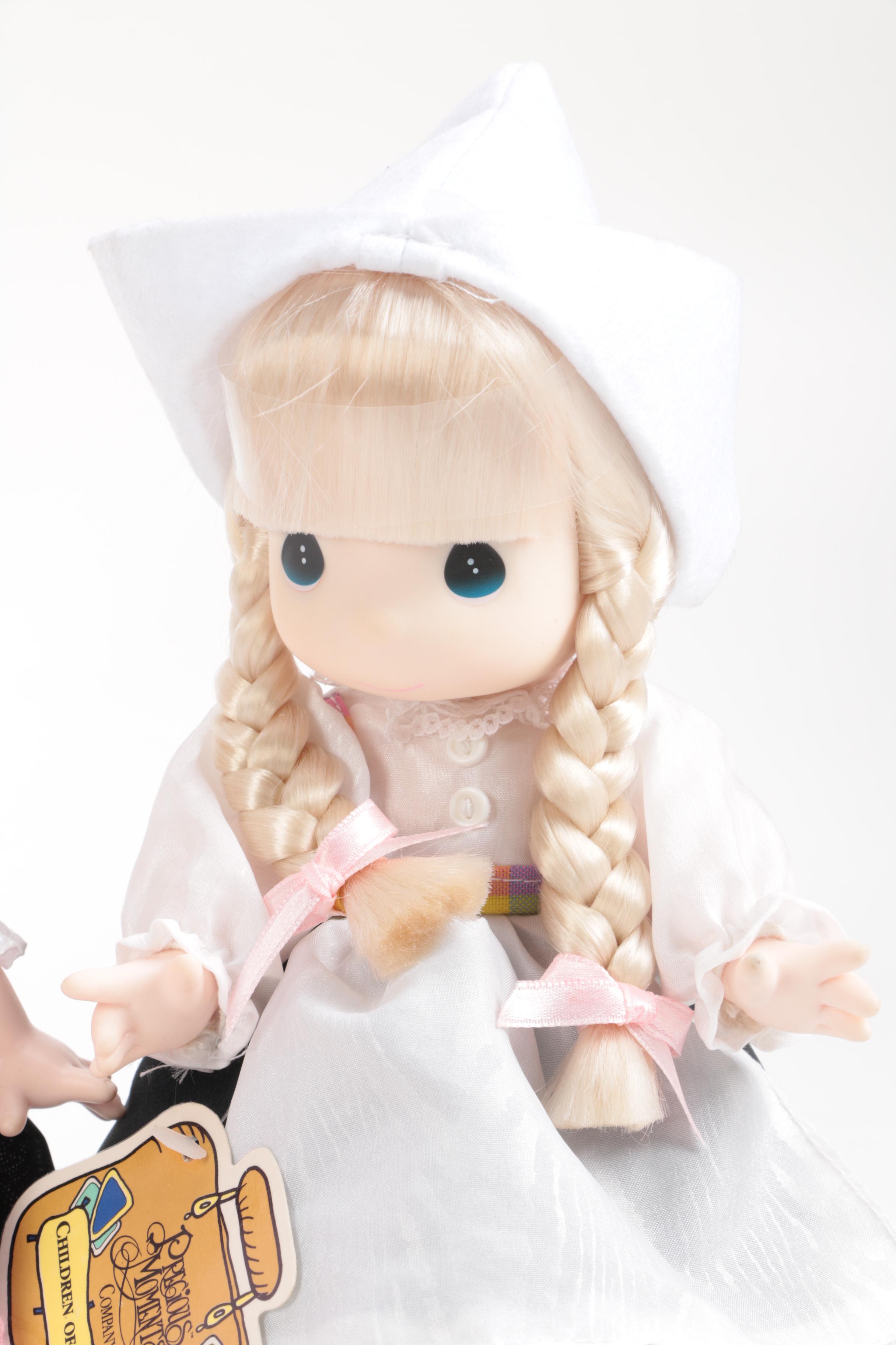 Generous Collection of Porcelain and Stuffed Dolls including Precious Moments