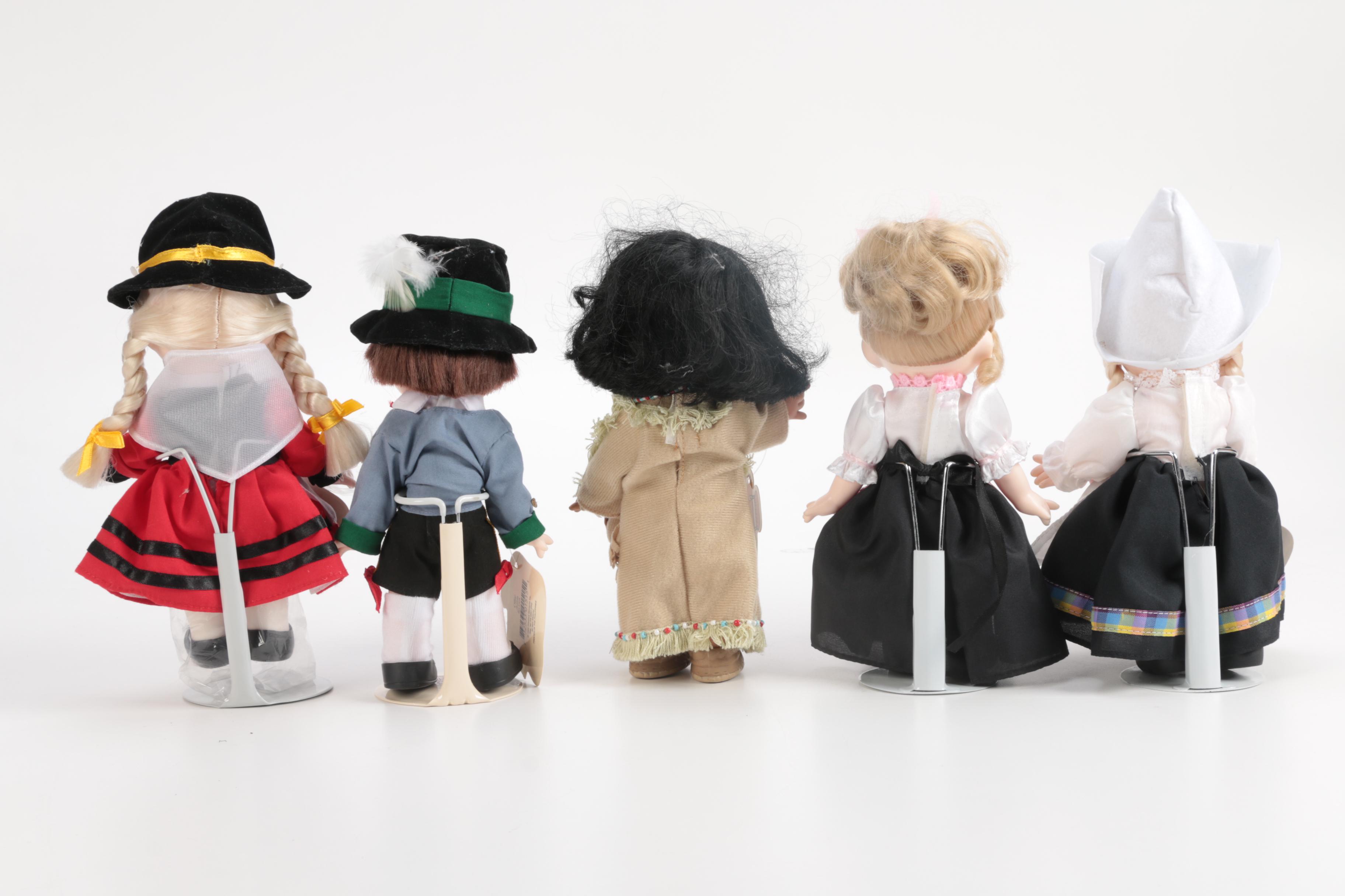 Generous Collection of Porcelain and Stuffed Dolls including Precious Moments