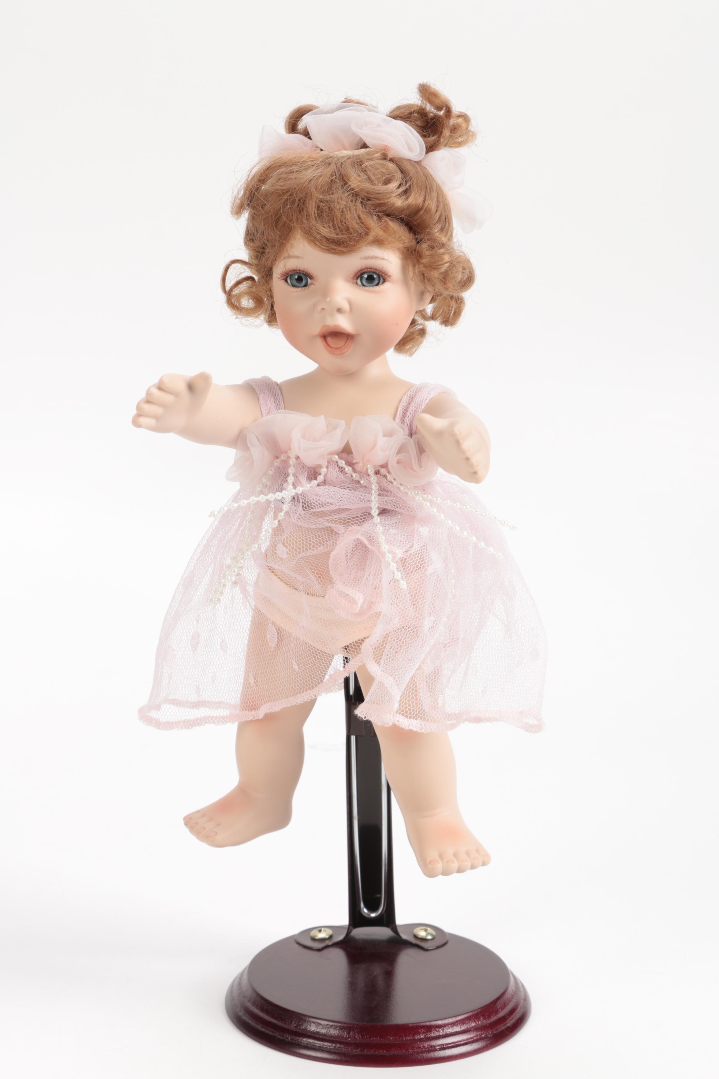 Generous Collection of Porcelain and Stuffed Dolls including Precious Moments