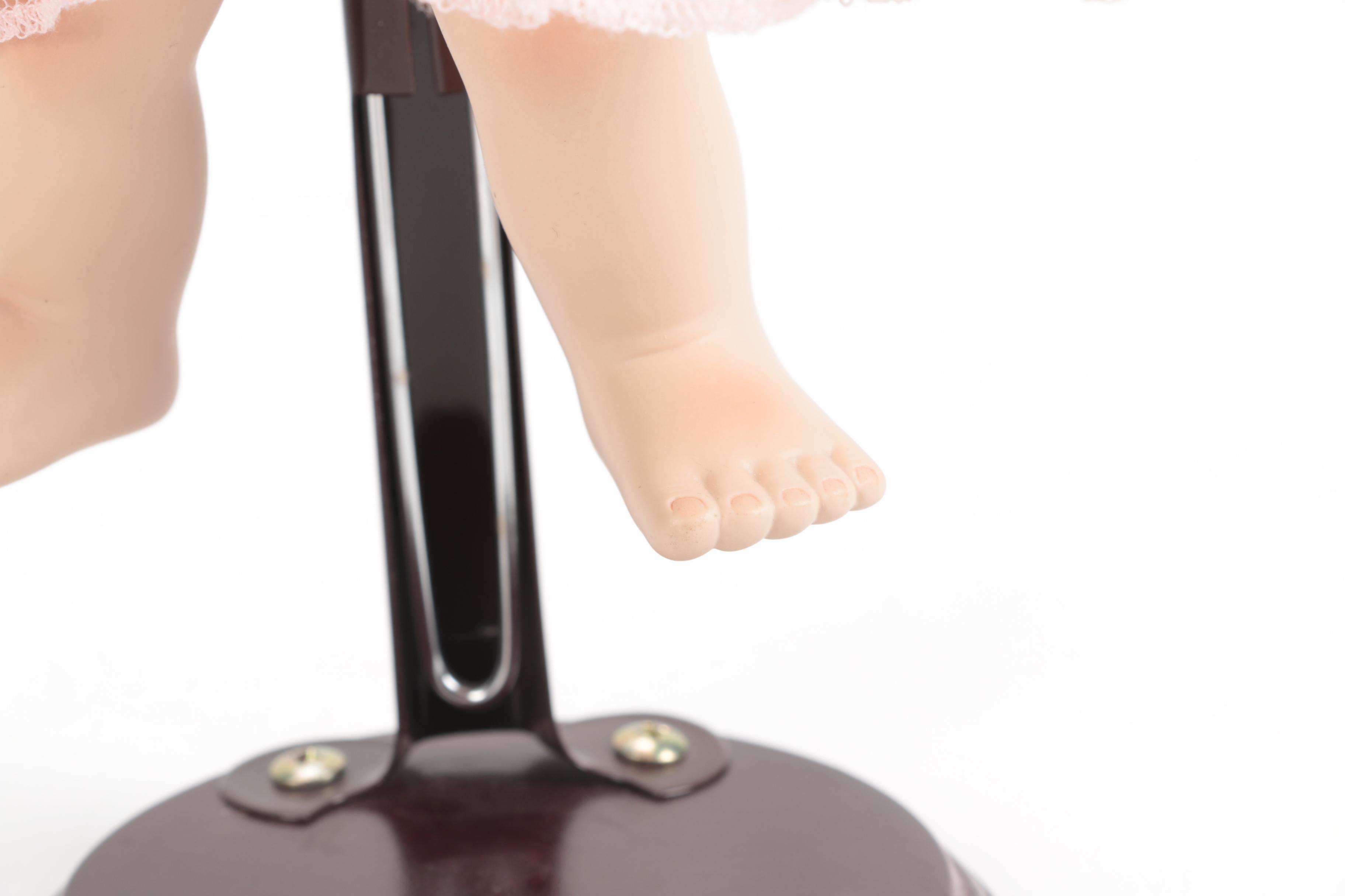 Generous Collection of Porcelain and Stuffed Dolls including Precious Moments