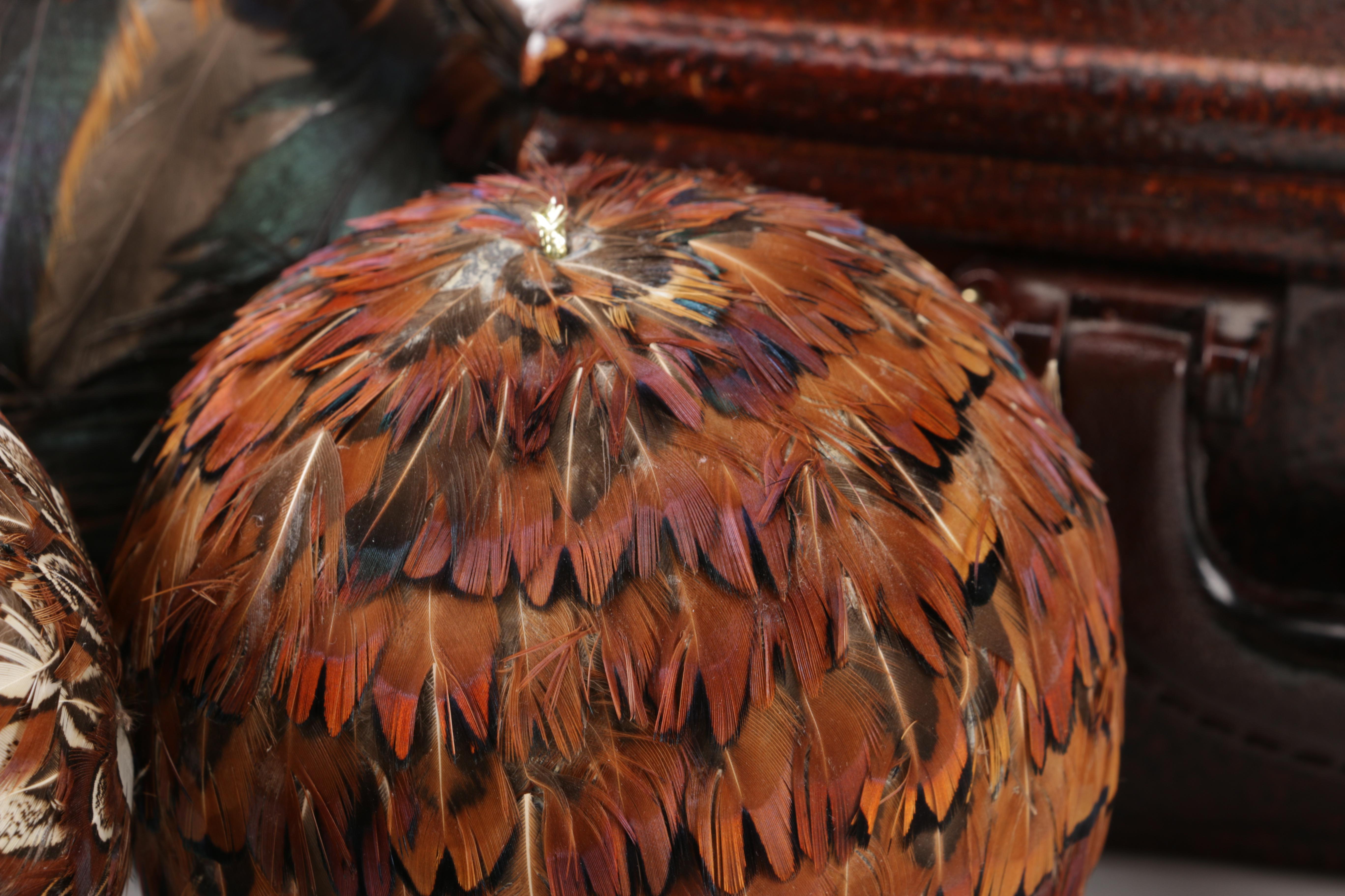 Luggage-Style Box, Pocket Watch Desk Clock, and Decorative Feather Spheres