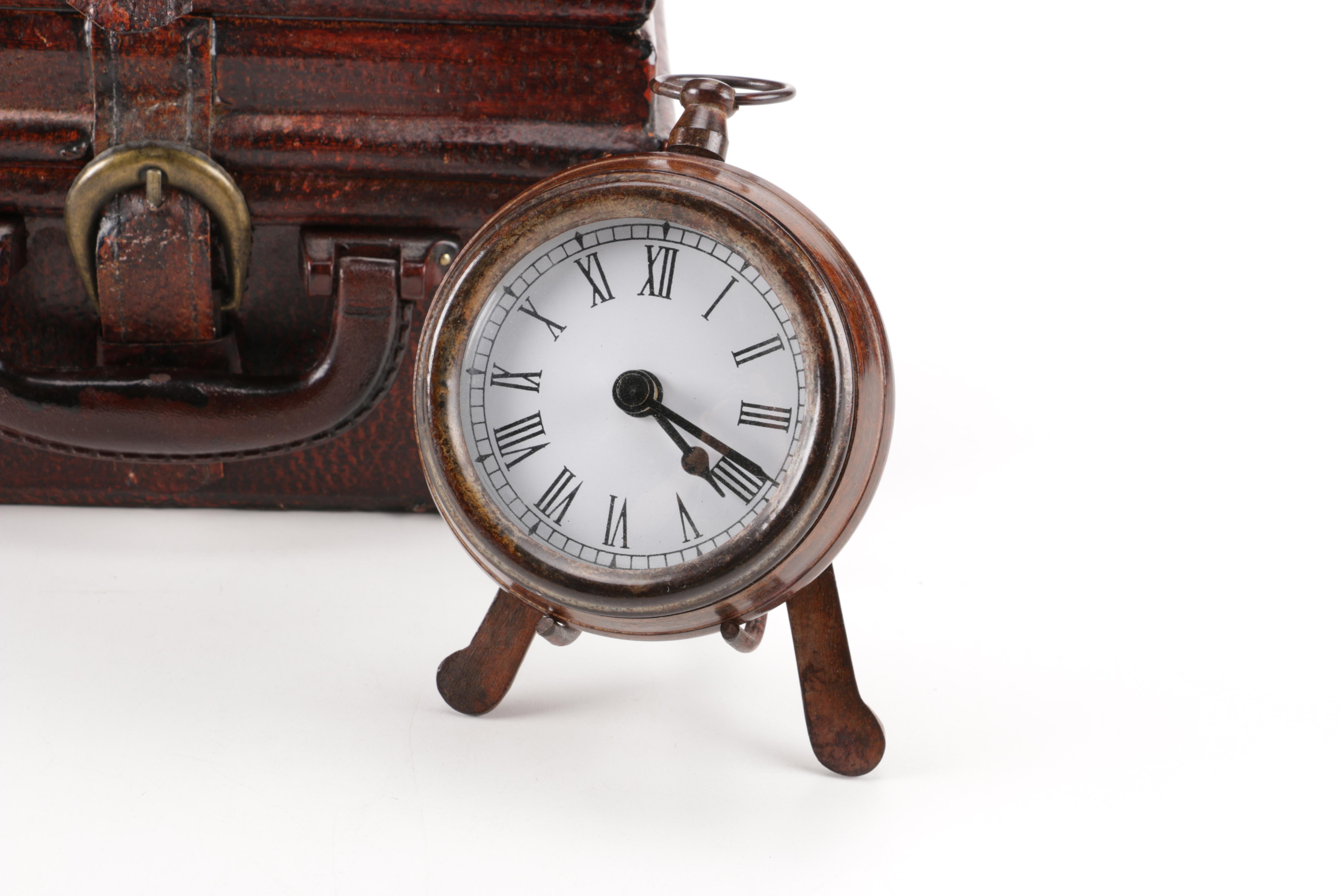 Luggage-Style Box, Pocket Watch Desk Clock, and Decorative Feather Spheres
