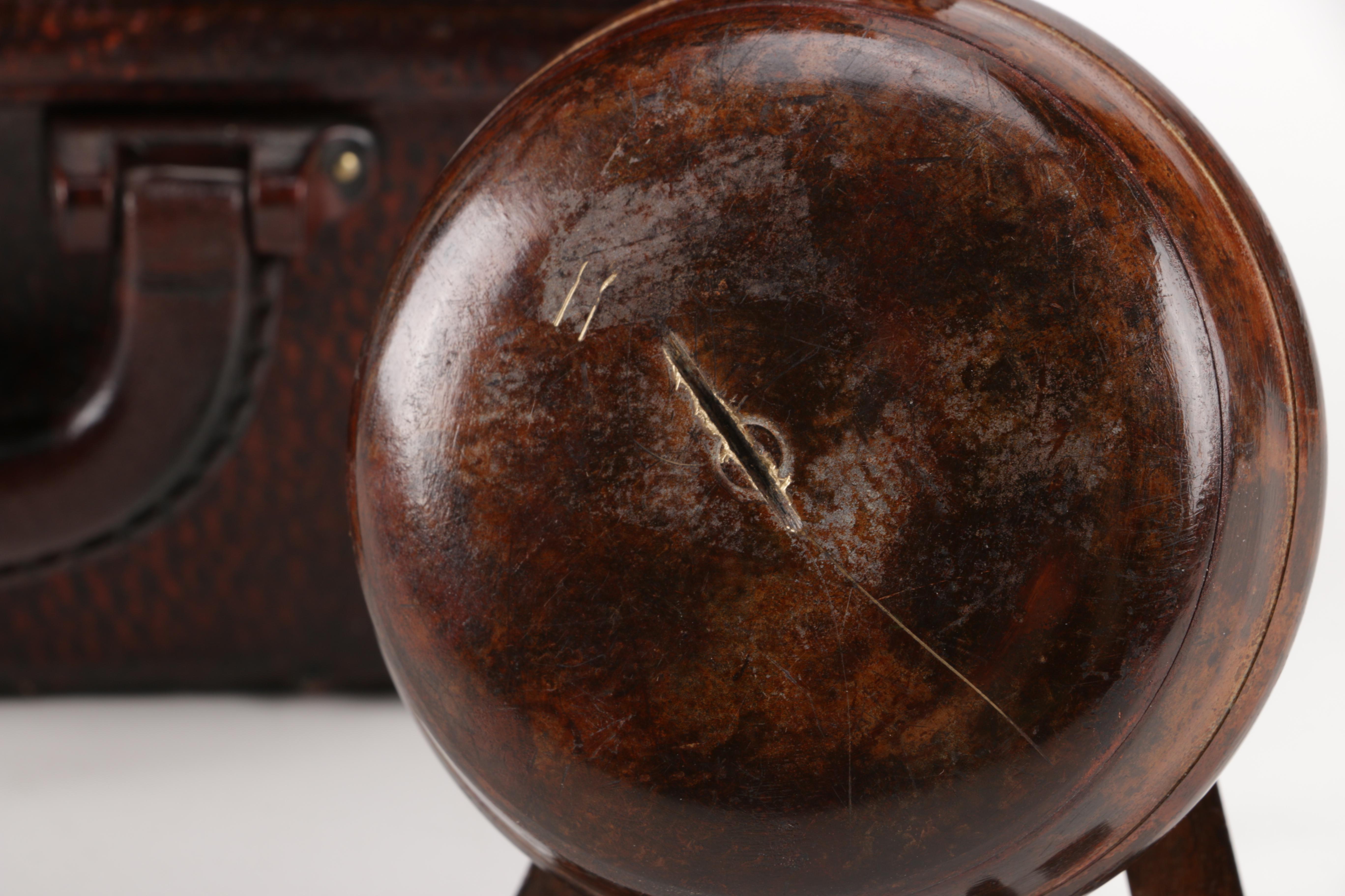 Luggage-Style Box, Pocket Watch Desk Clock, and Decorative Feather Spheres