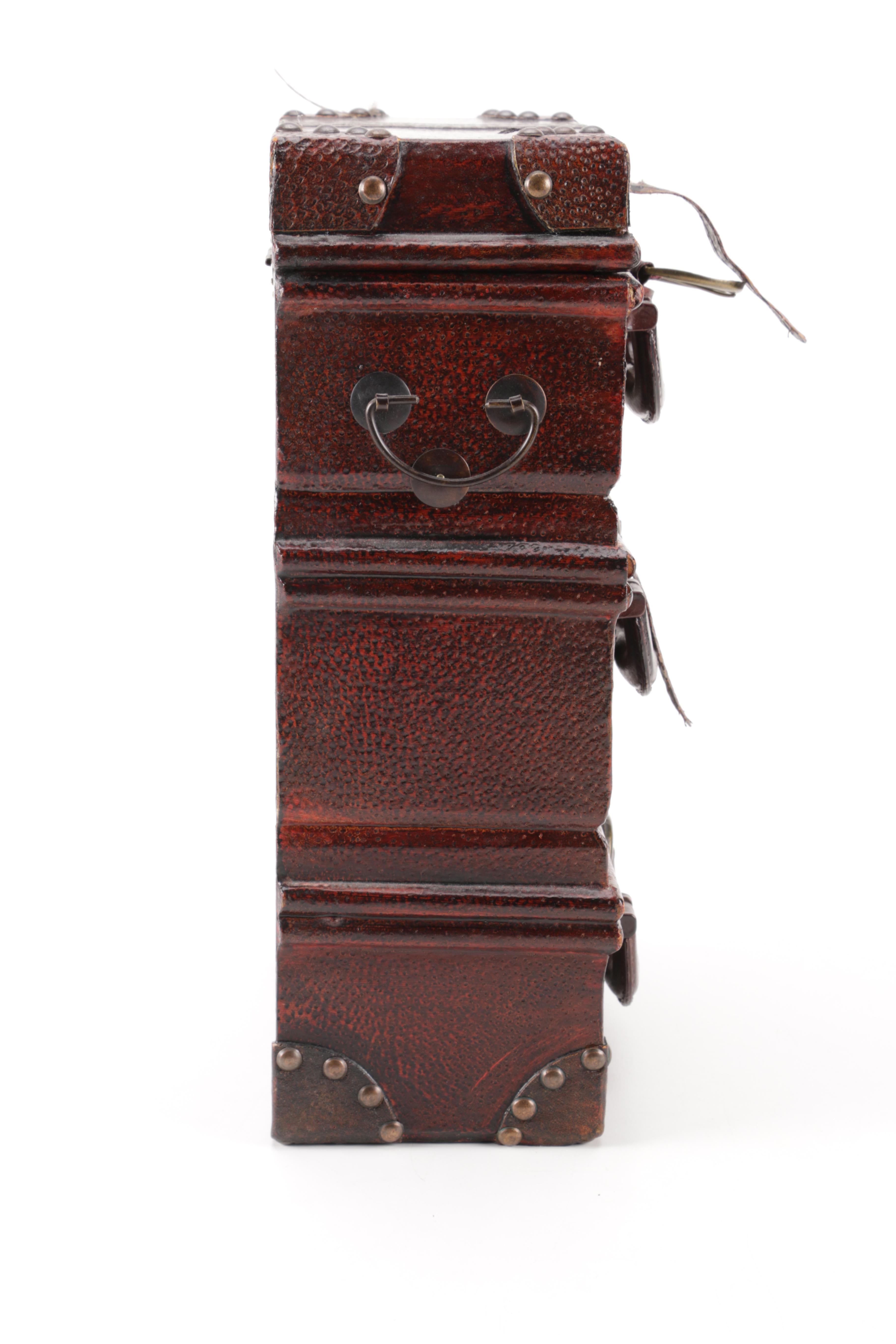 Luggage-Style Box, Pocket Watch Desk Clock, and Decorative Feather Spheres