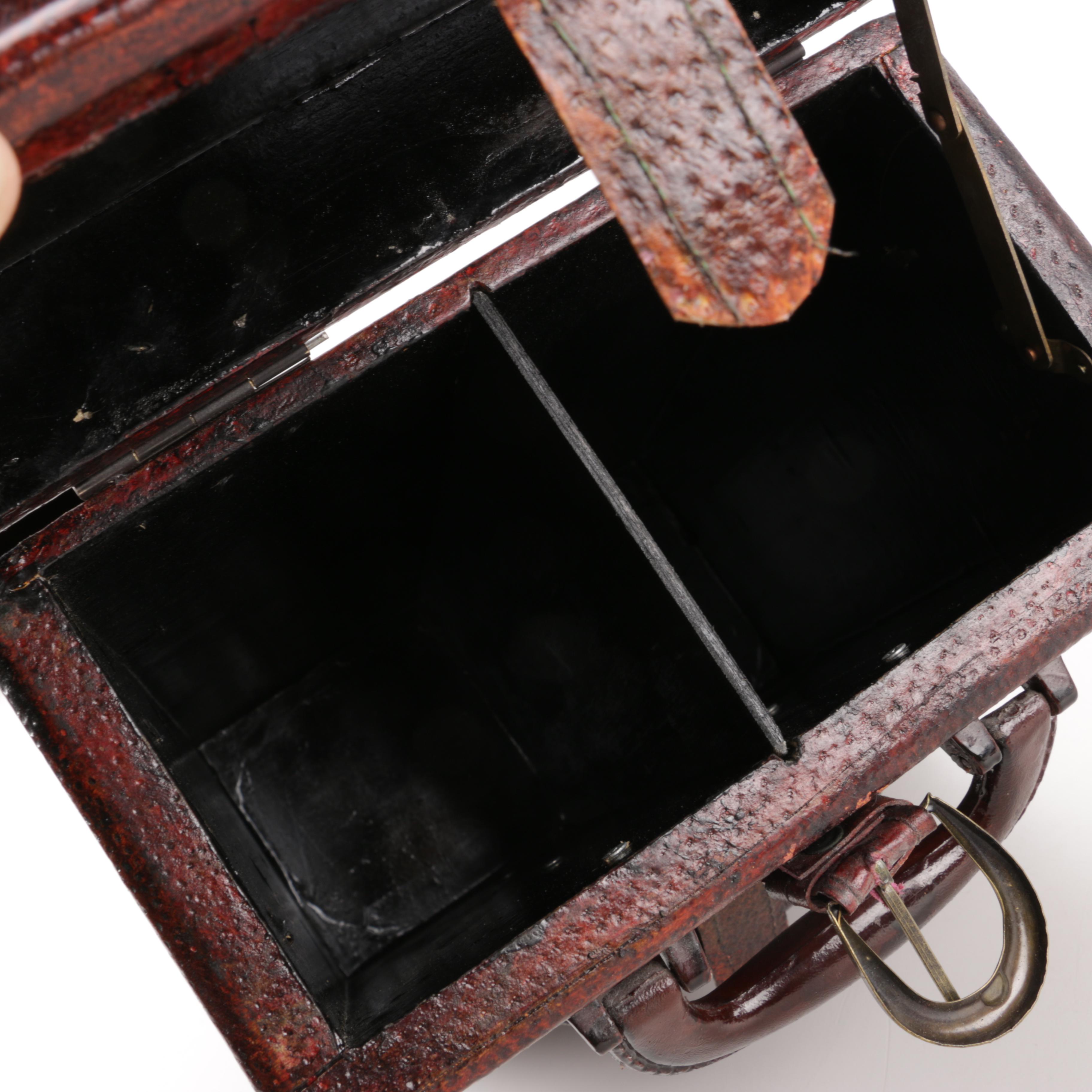 Luggage-Style Box, Pocket Watch Desk Clock, and Decorative Feather Spheres