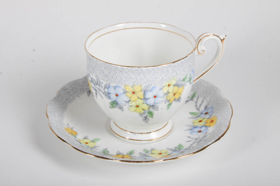 Collection of China Teacups and Matching Saucers
