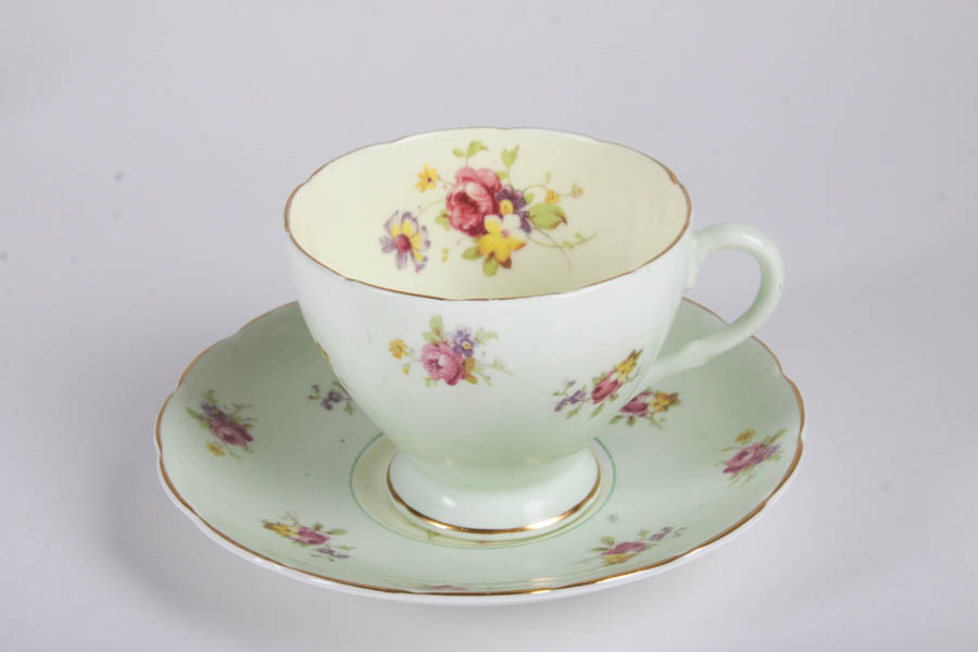 Collection of China Teacups and Matching Saucers