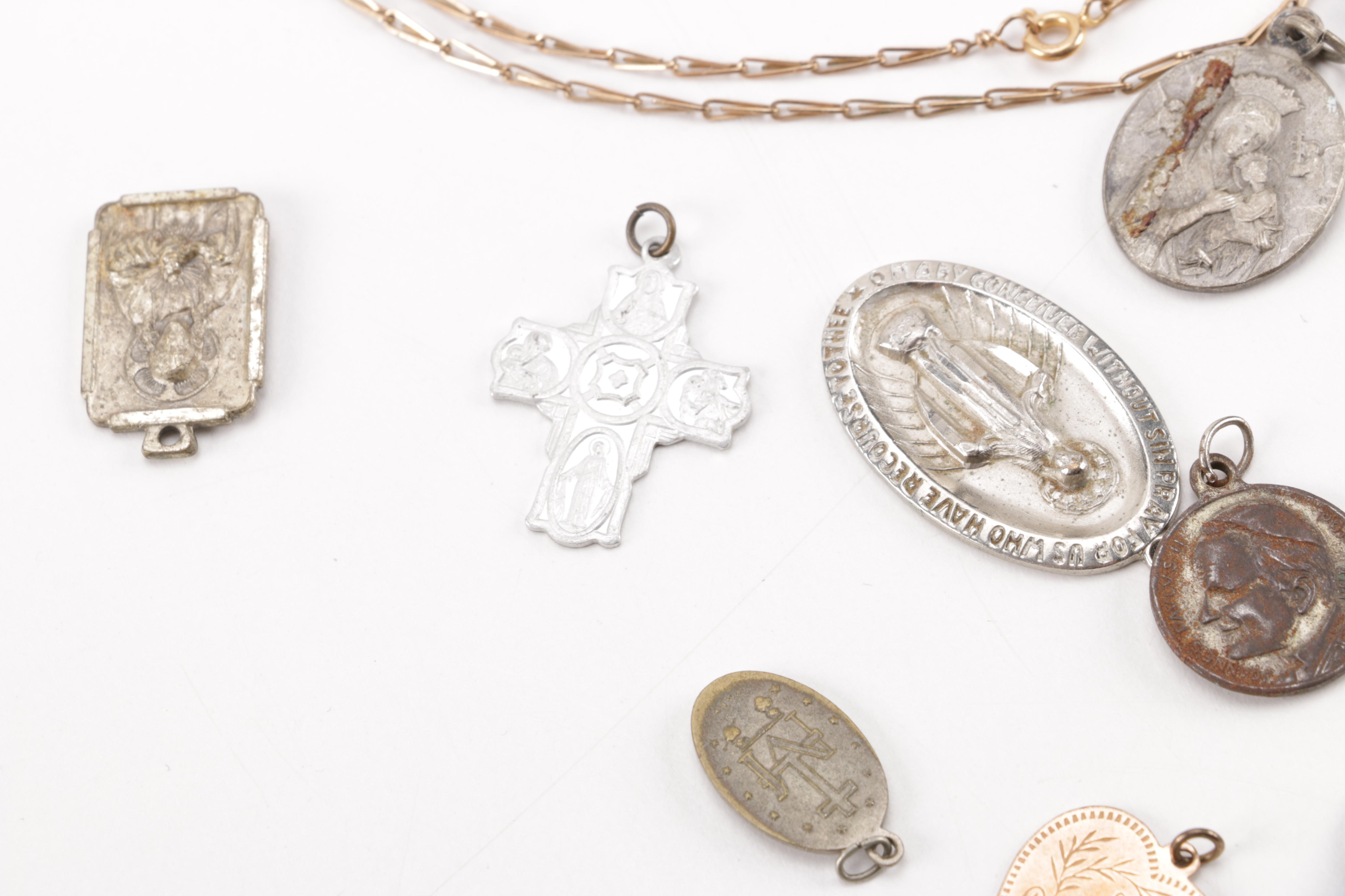 Vintage Costume Jewelry Including Religious Pendants and Diamonds