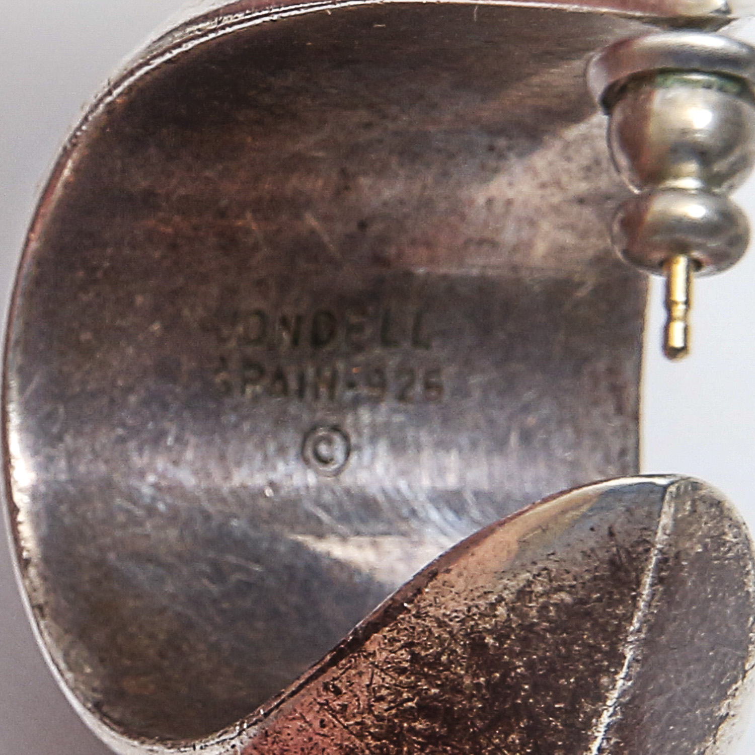 Grouping of Sterling Silver Earrings and Charm