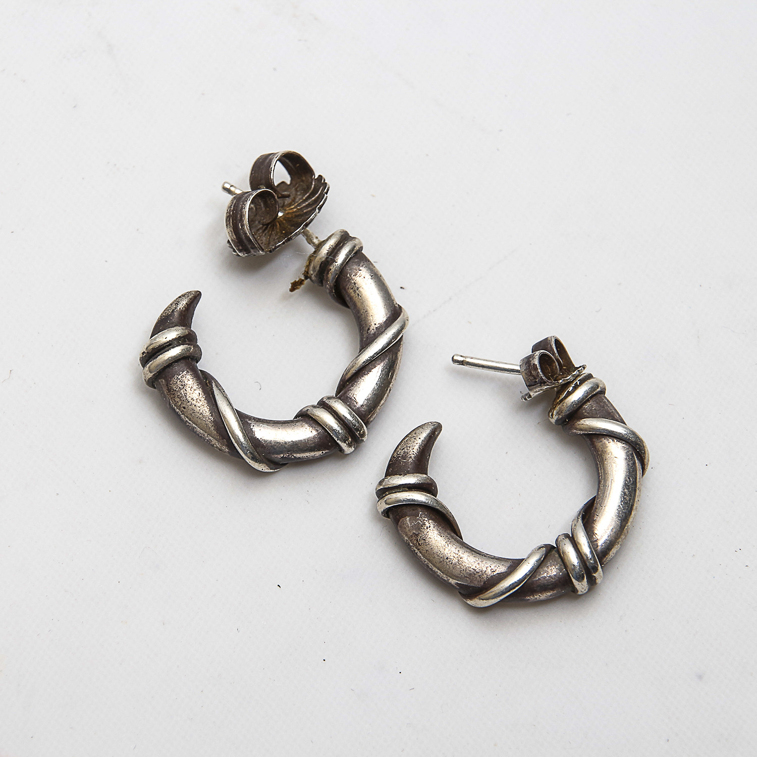 Grouping of Sterling Silver Earrings and Charm