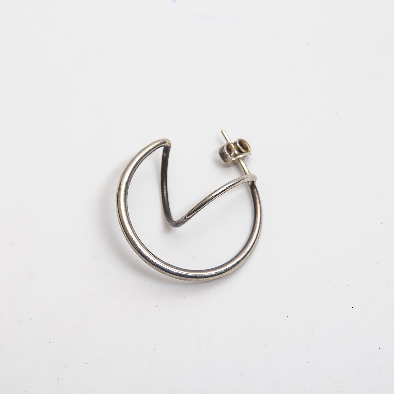 Grouping of Sterling Silver Earrings and Charm