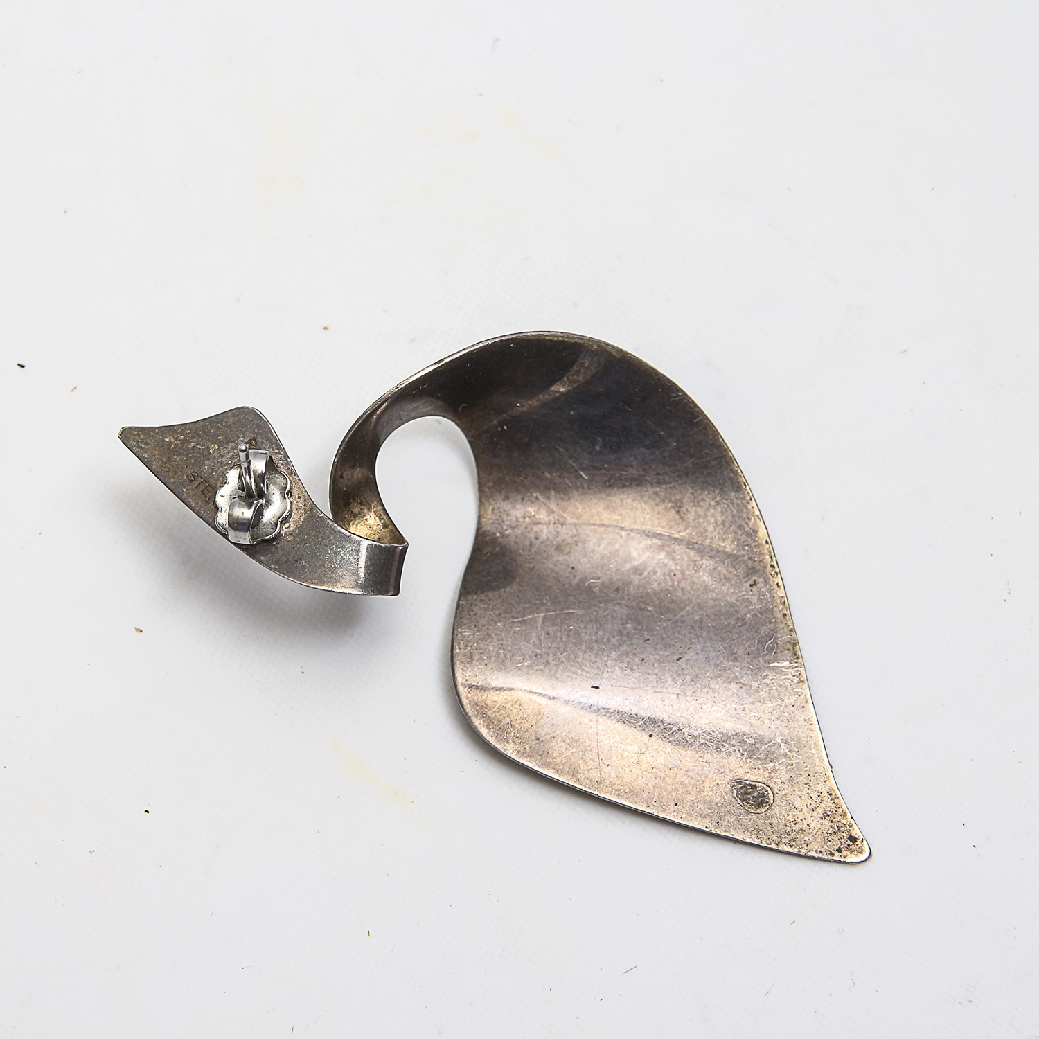 Grouping of Sterling Silver Earrings and Charm