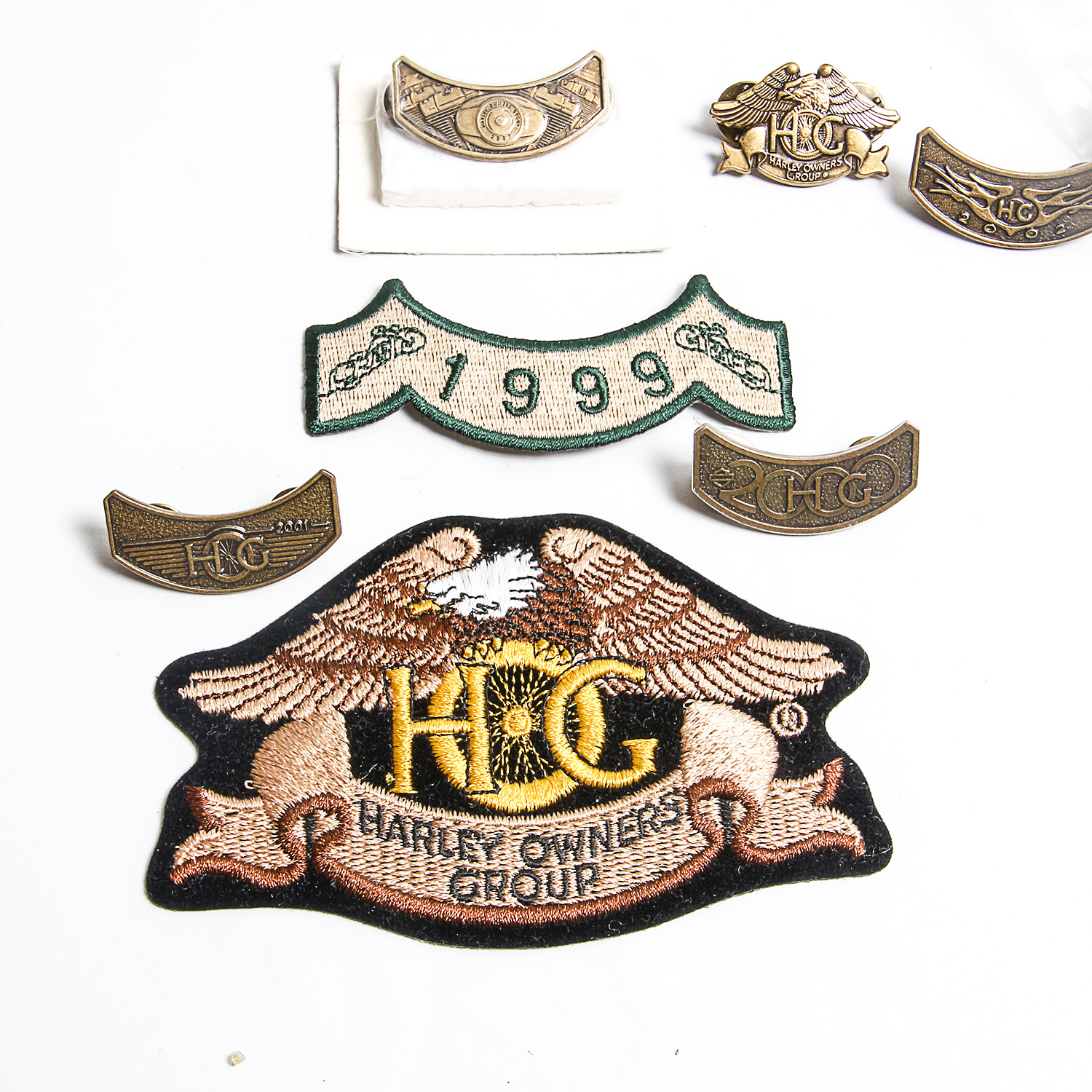 Collection of Motorcycle-Related Patches and Pinbacks