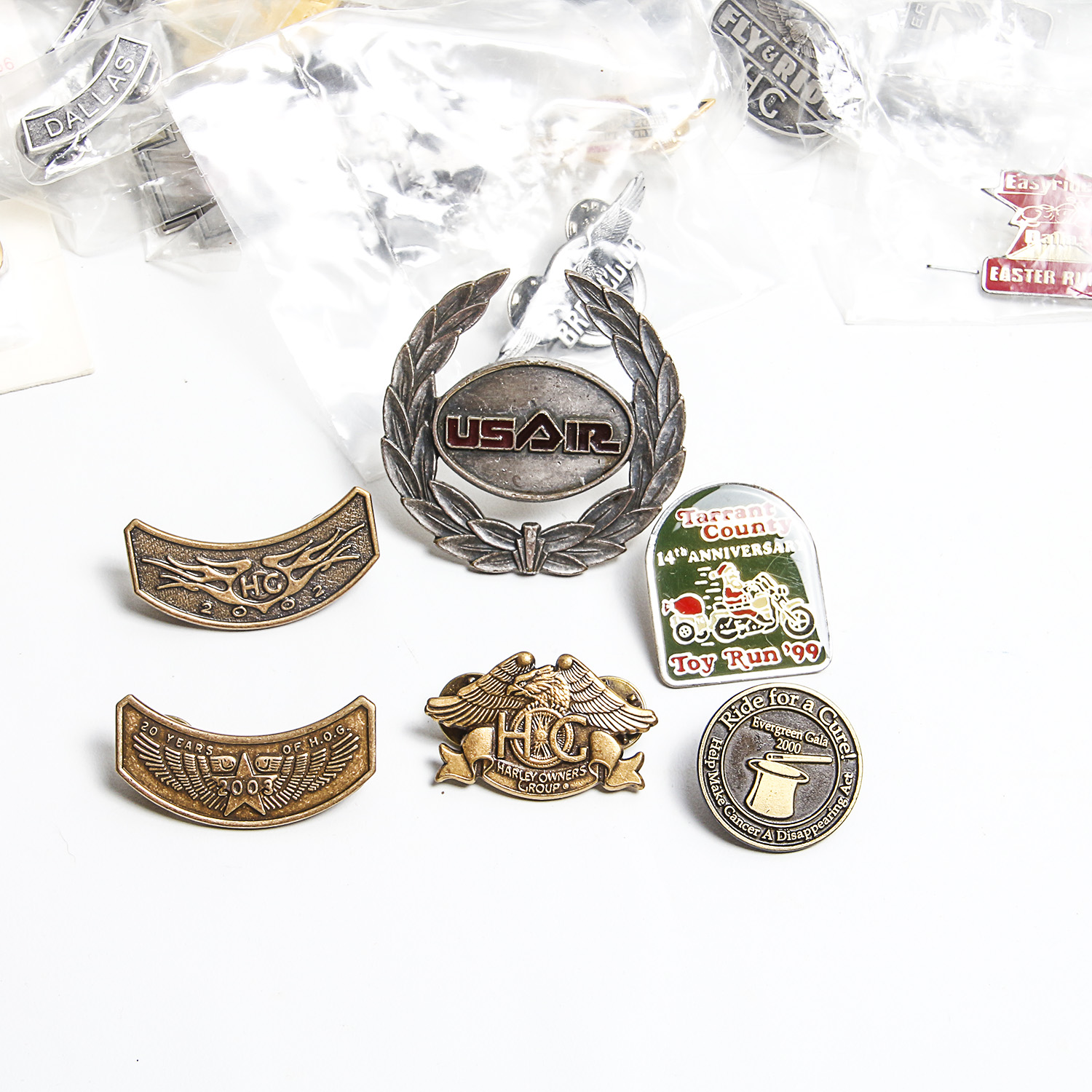 Collection of Motorcycle-Related Patches and Pinbacks