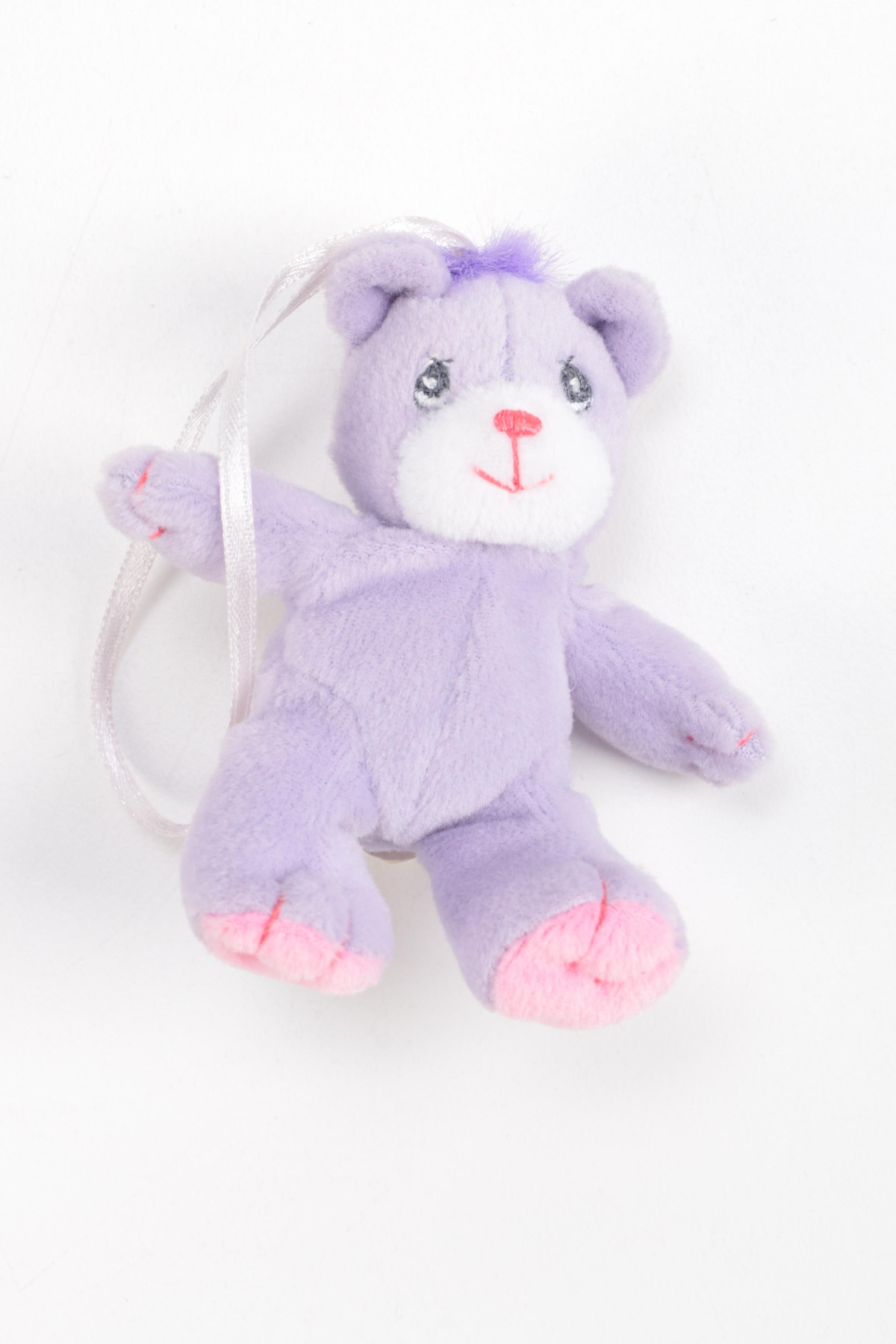 Generous Collection of Porcelain and Stuffed Dolls including Precious Moments