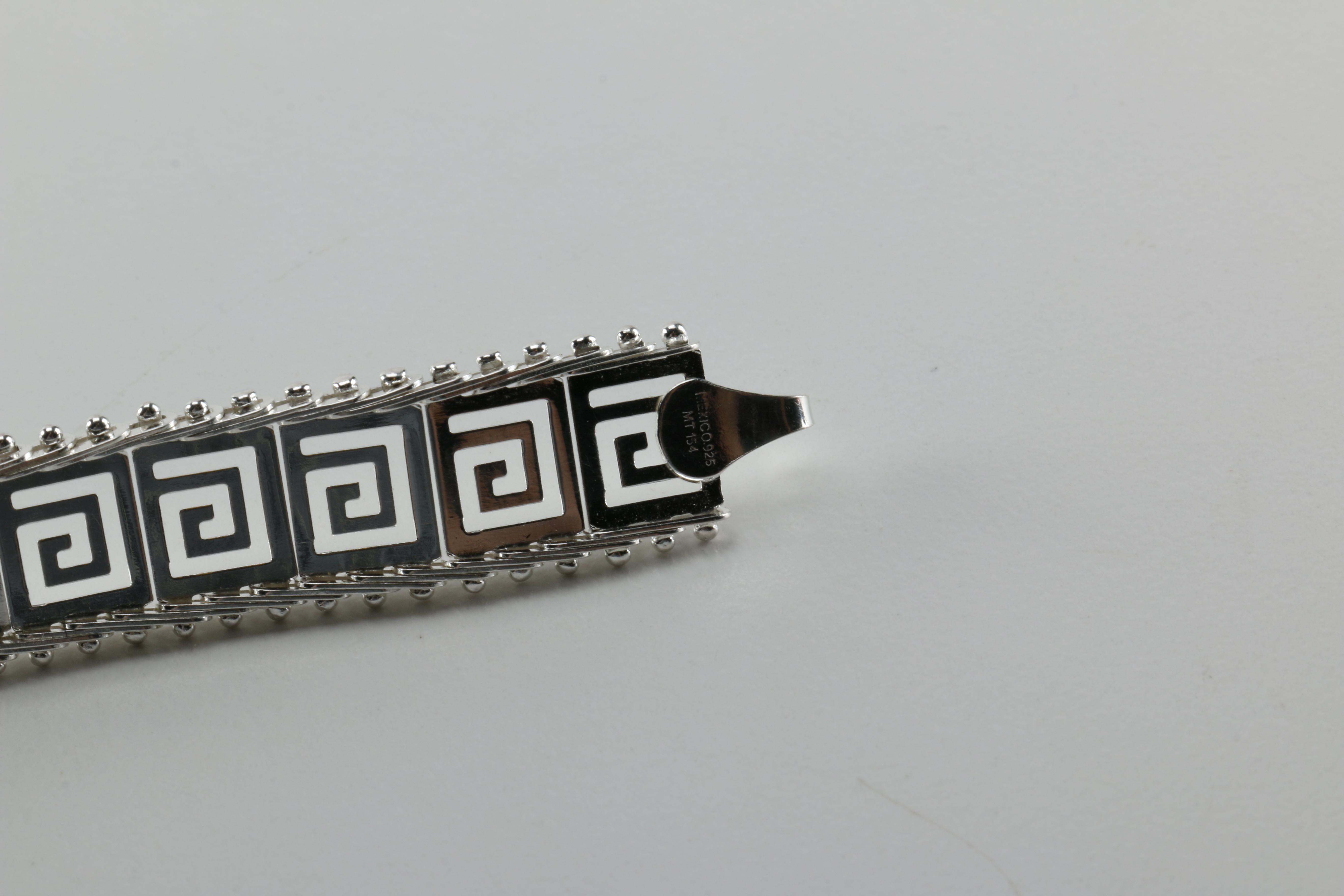 Sterling Silver Jewelry Including a Necklace With an Amber Pendant