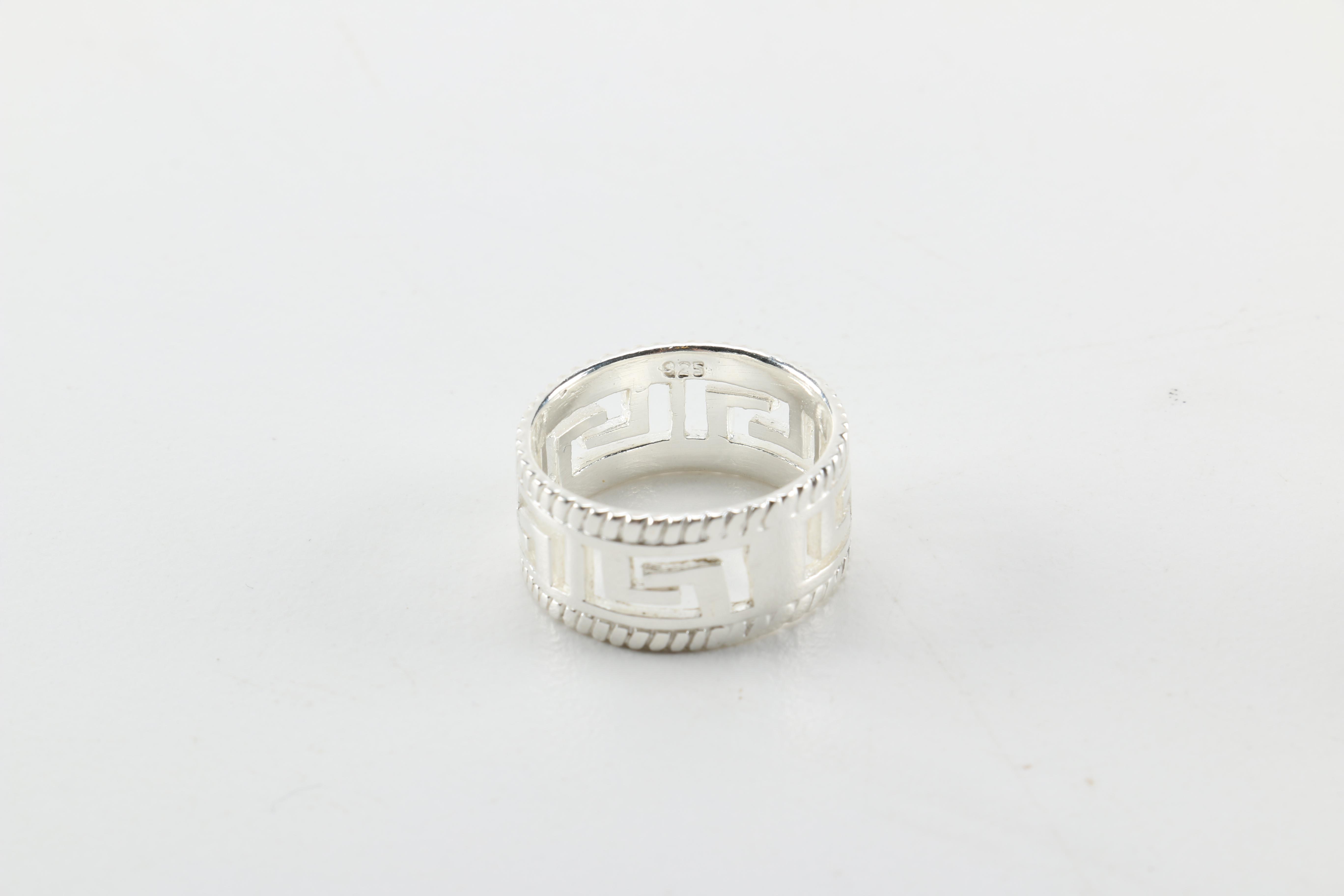 Sterling Silver Jewelry Including a Necklace With an Amber Pendant