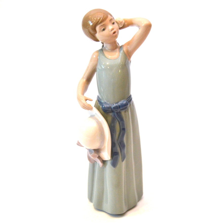 Lladro "Prissy Girl with Straw Hat"