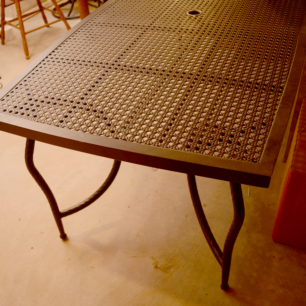 Metal Table With Cane Inset Top and Umbrella
