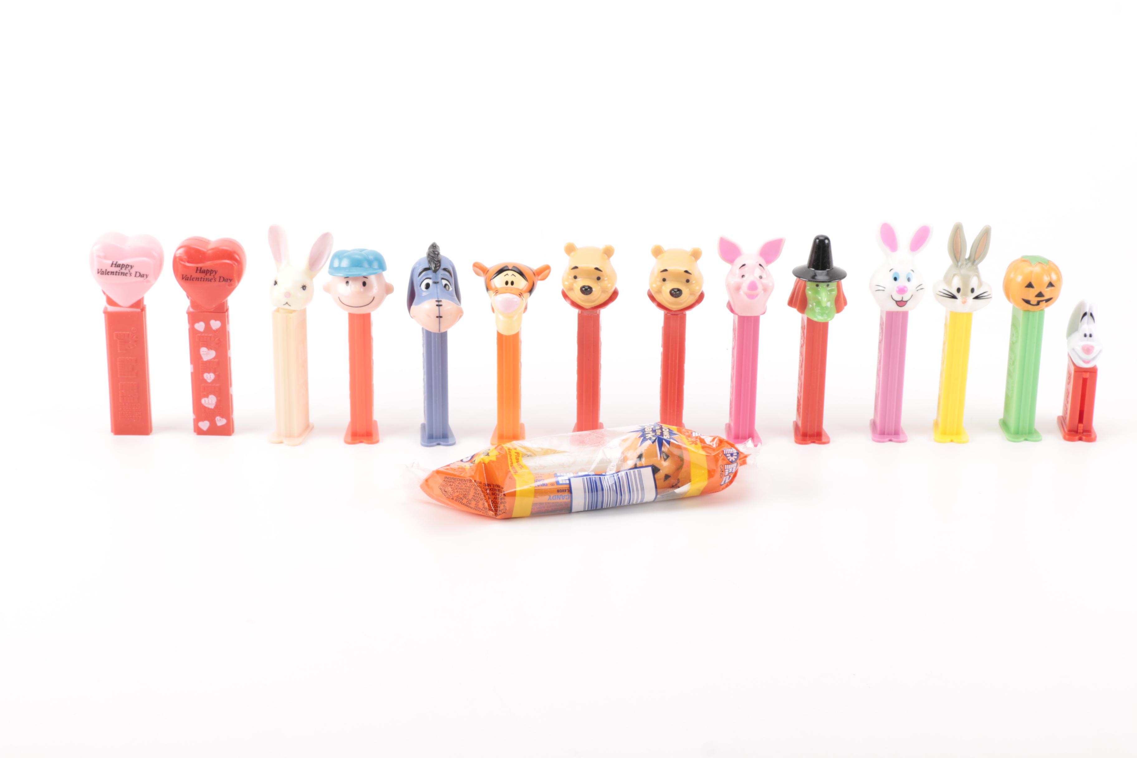 Pez Dispenser Collection Featuring Winnie the Pooh and Wizard of Oz Figurines