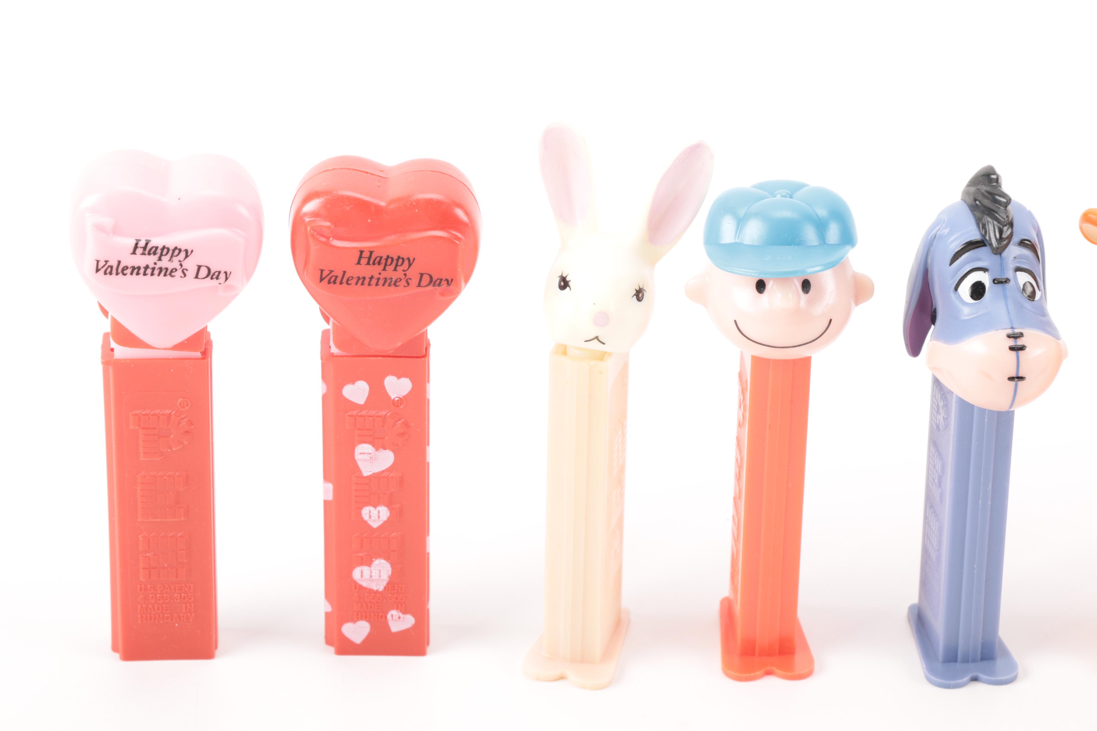 Pez Dispenser Collection Featuring Winnie the Pooh and Wizard of Oz Figurines