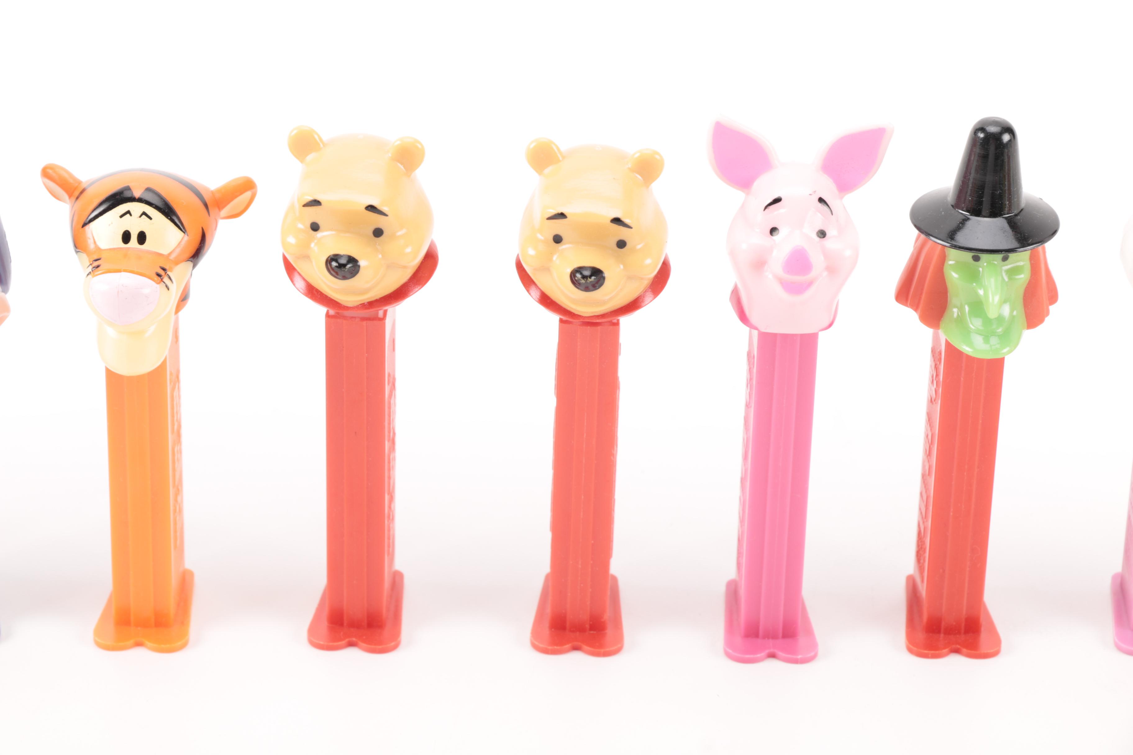 Pez Dispenser Collection Featuring Winnie the Pooh and Wizard of Oz Figurines