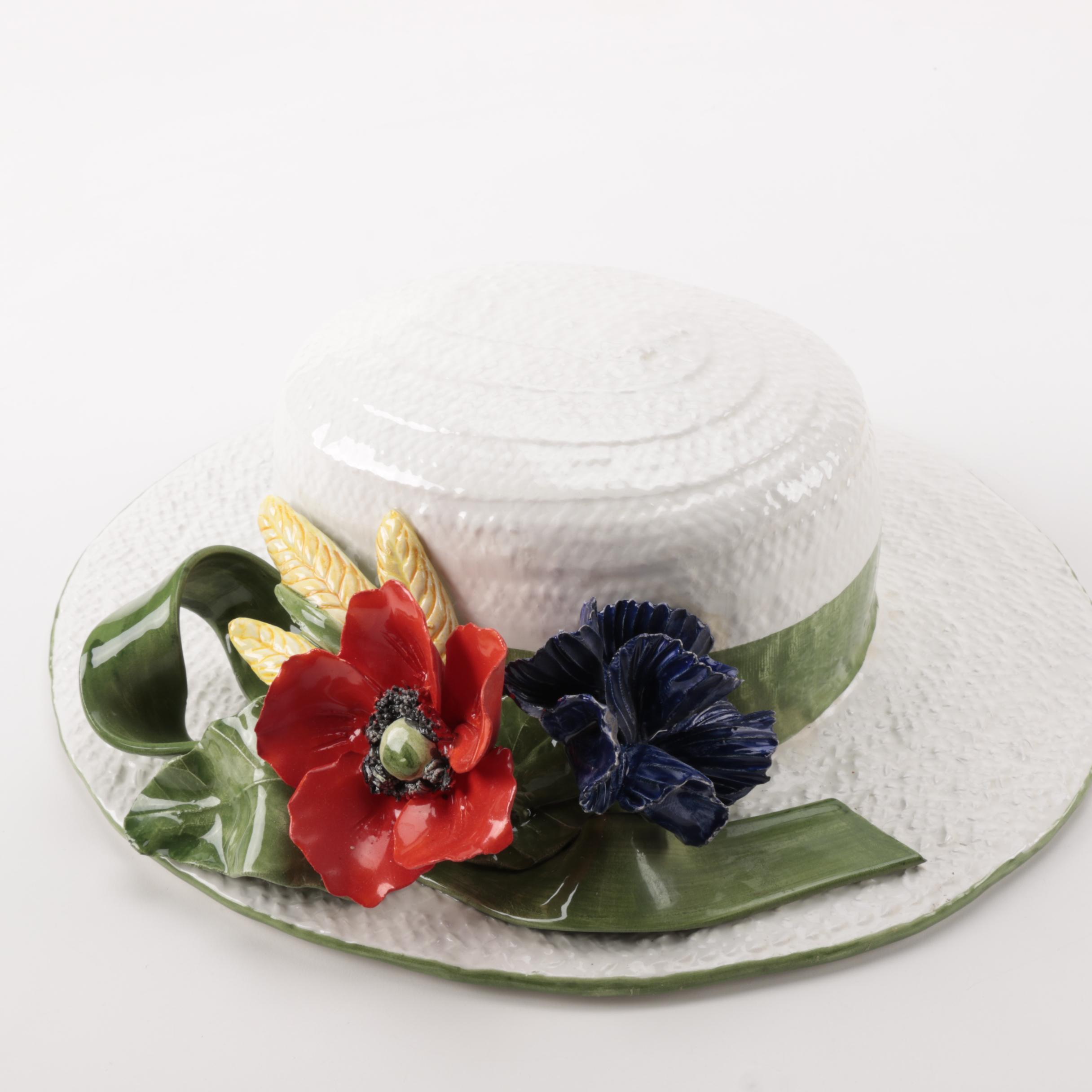 White and Brown Ceramic Sun Hat Figurines