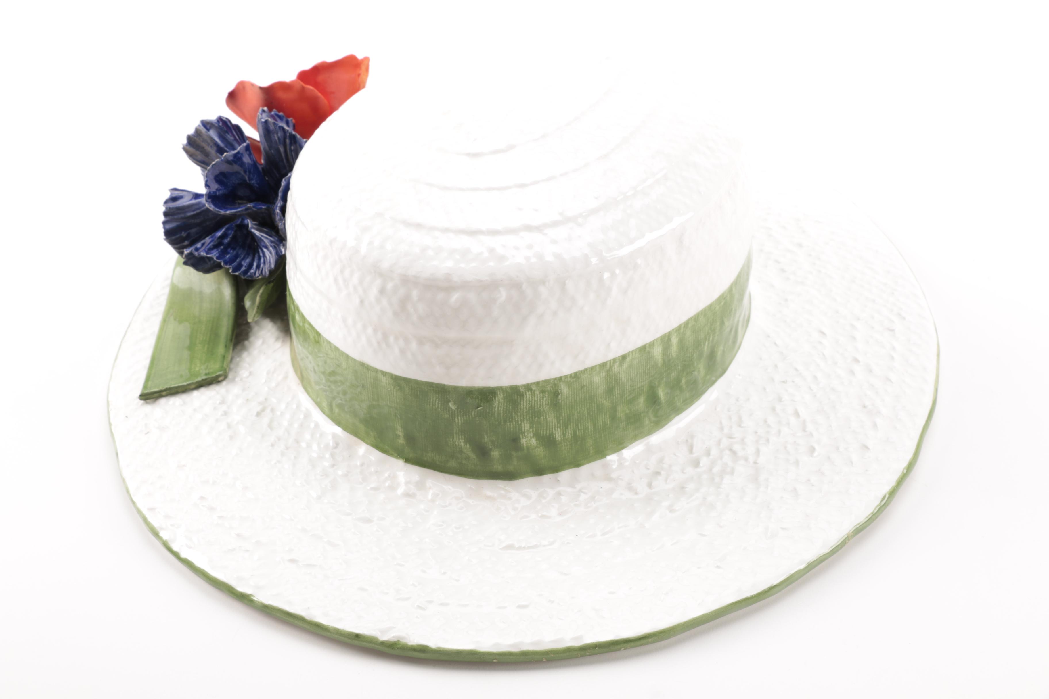 White and Brown Ceramic Sun Hat Figurines