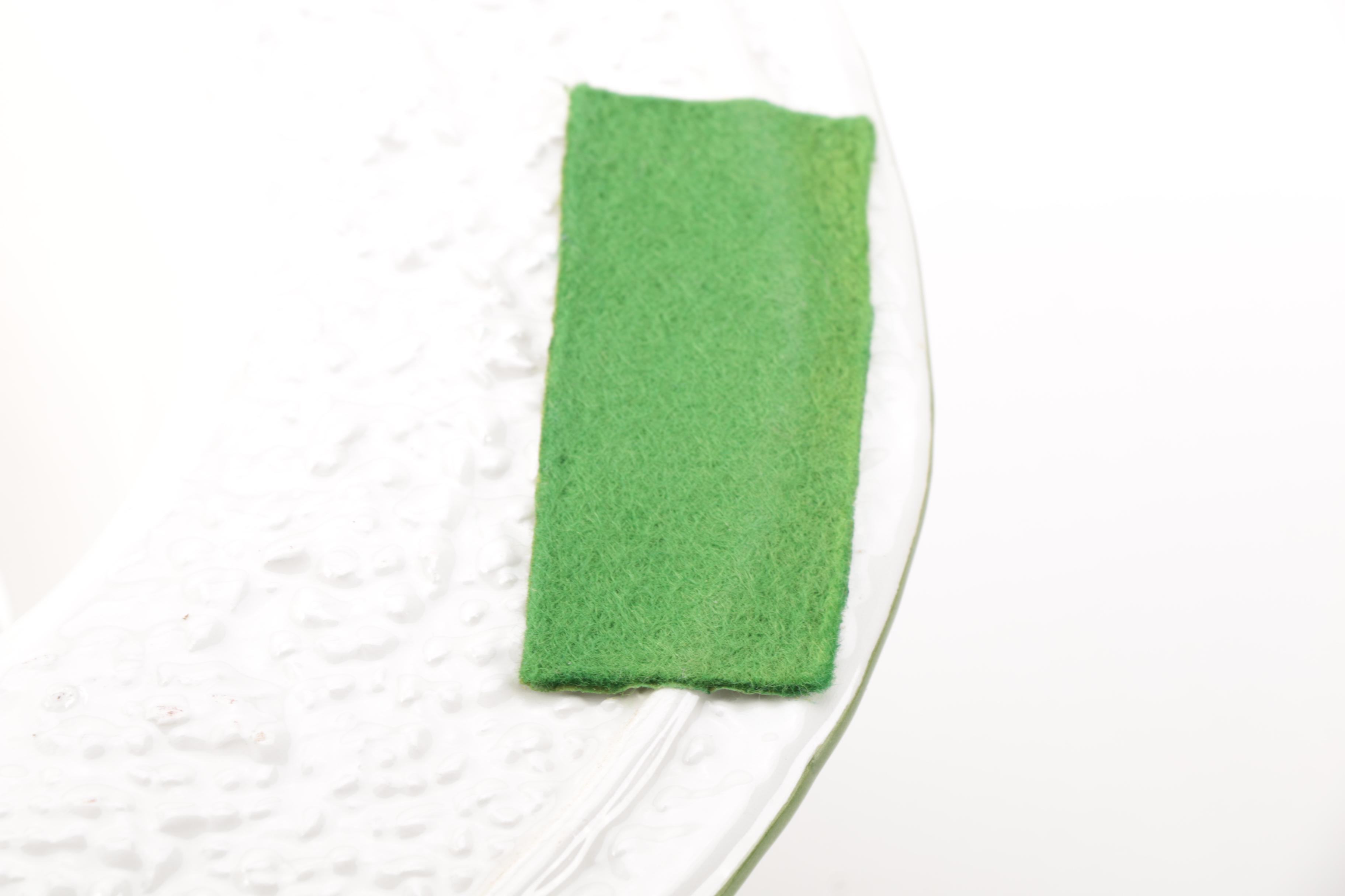 White and Brown Ceramic Sun Hat Figurines