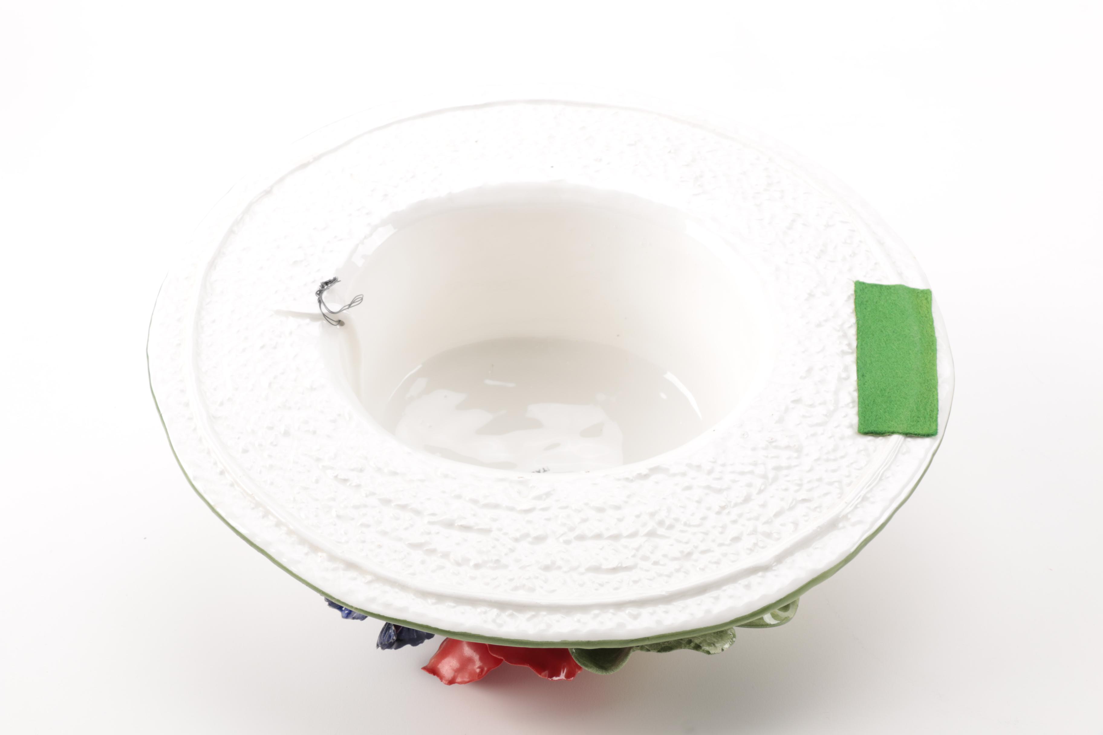 White and Brown Ceramic Sun Hat Figurines