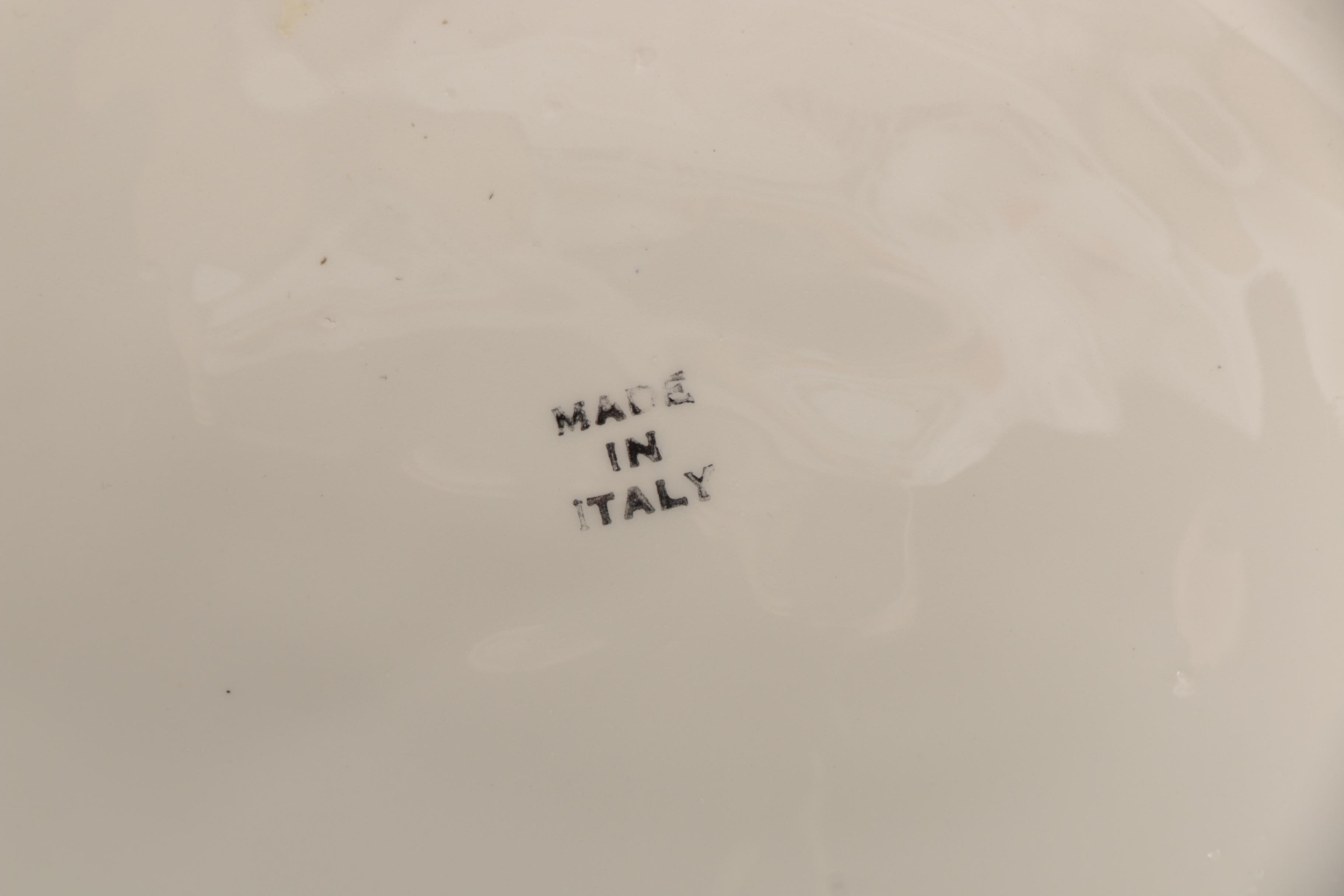 White and Brown Ceramic Sun Hat Figurines