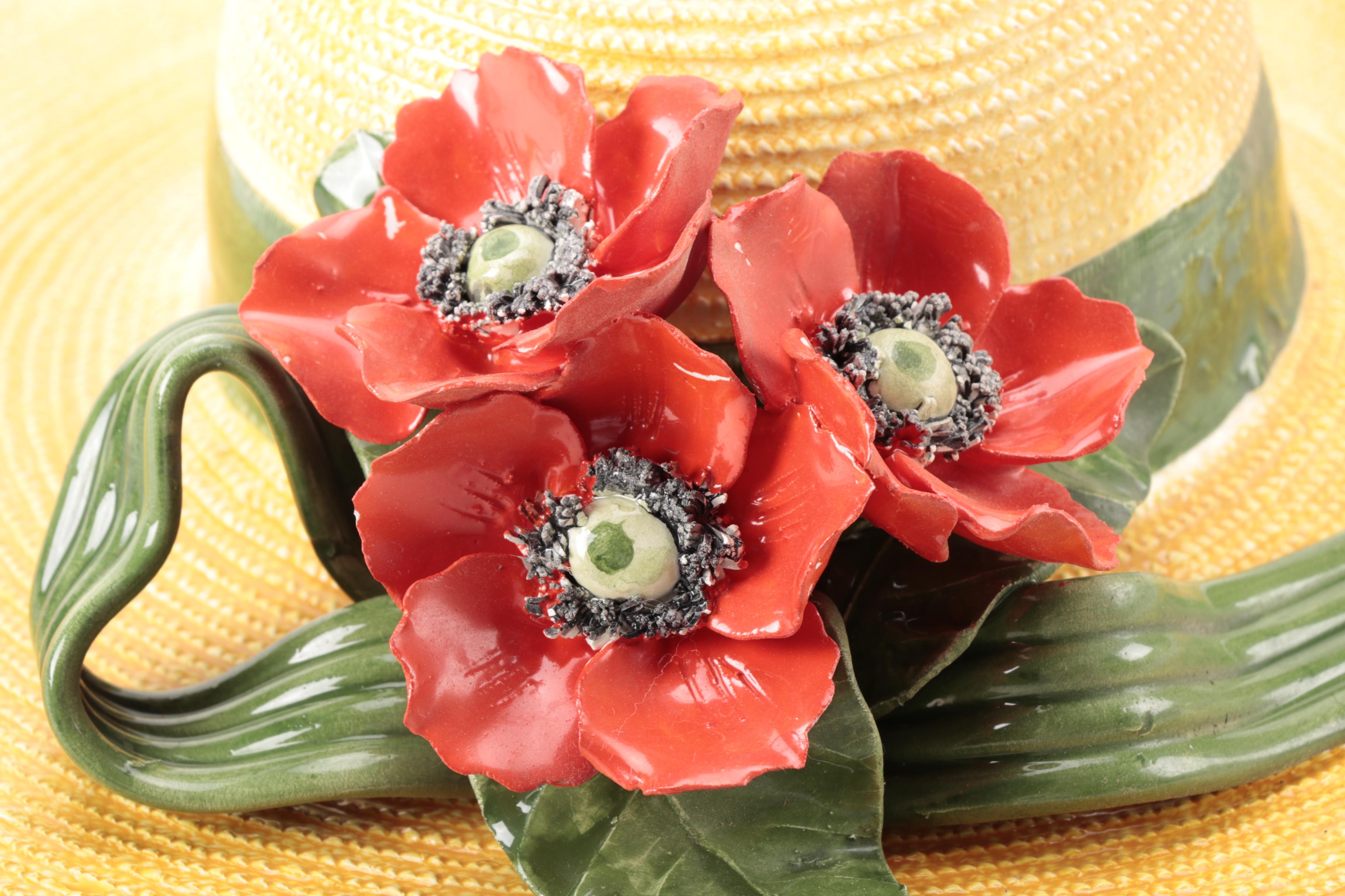 White and Brown Ceramic Sun Hat Figurines