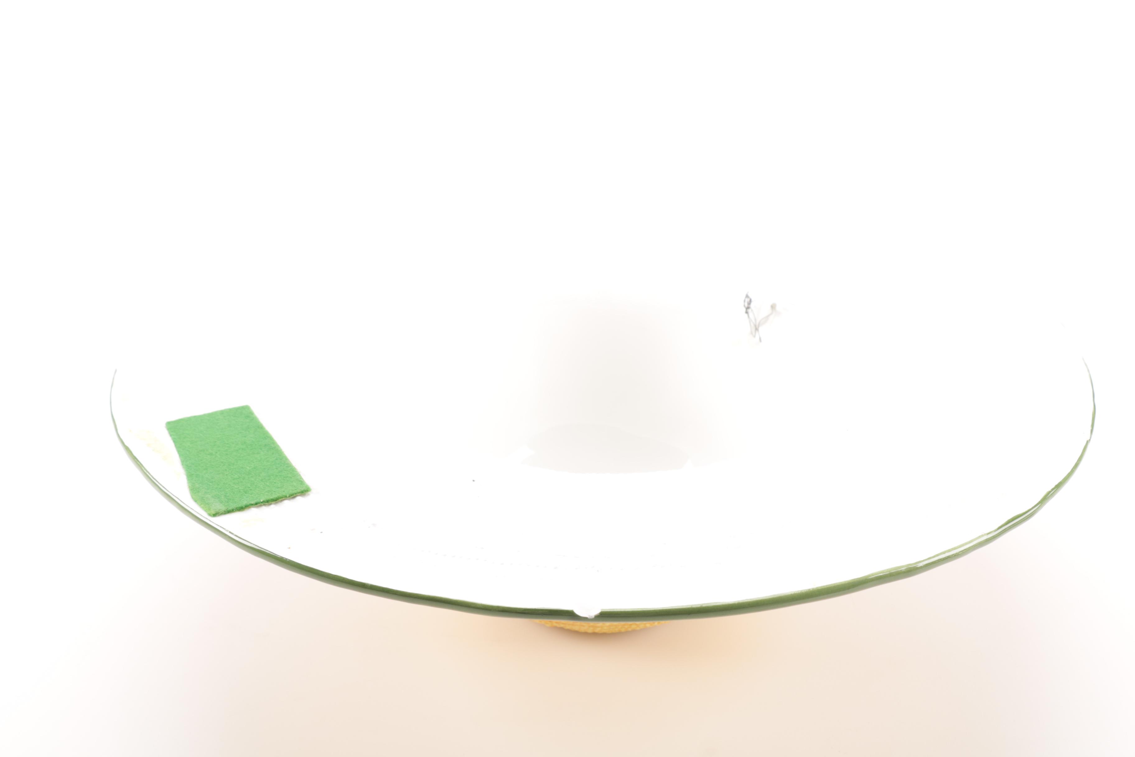 White and Brown Ceramic Sun Hat Figurines