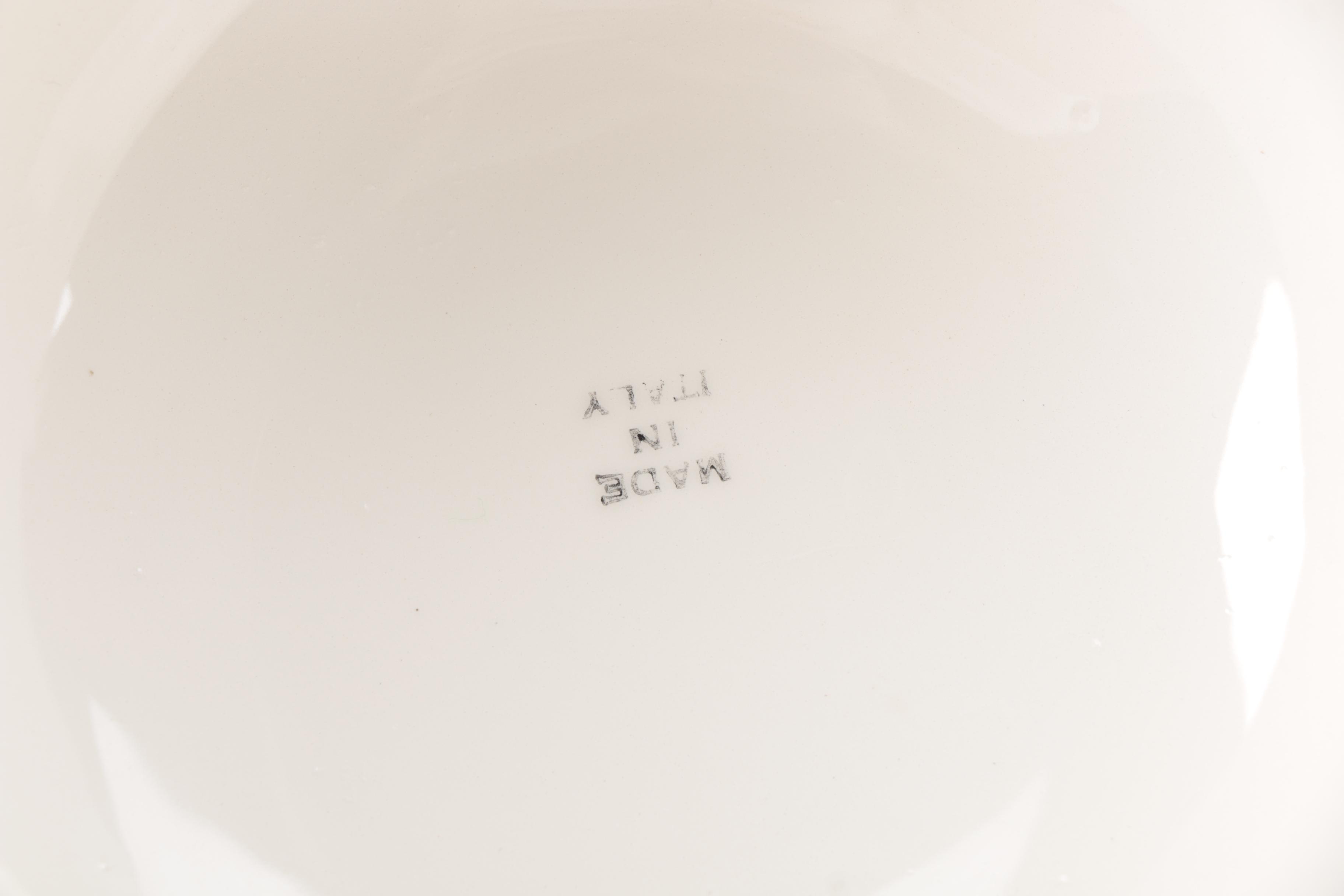 White and Brown Ceramic Sun Hat Figurines