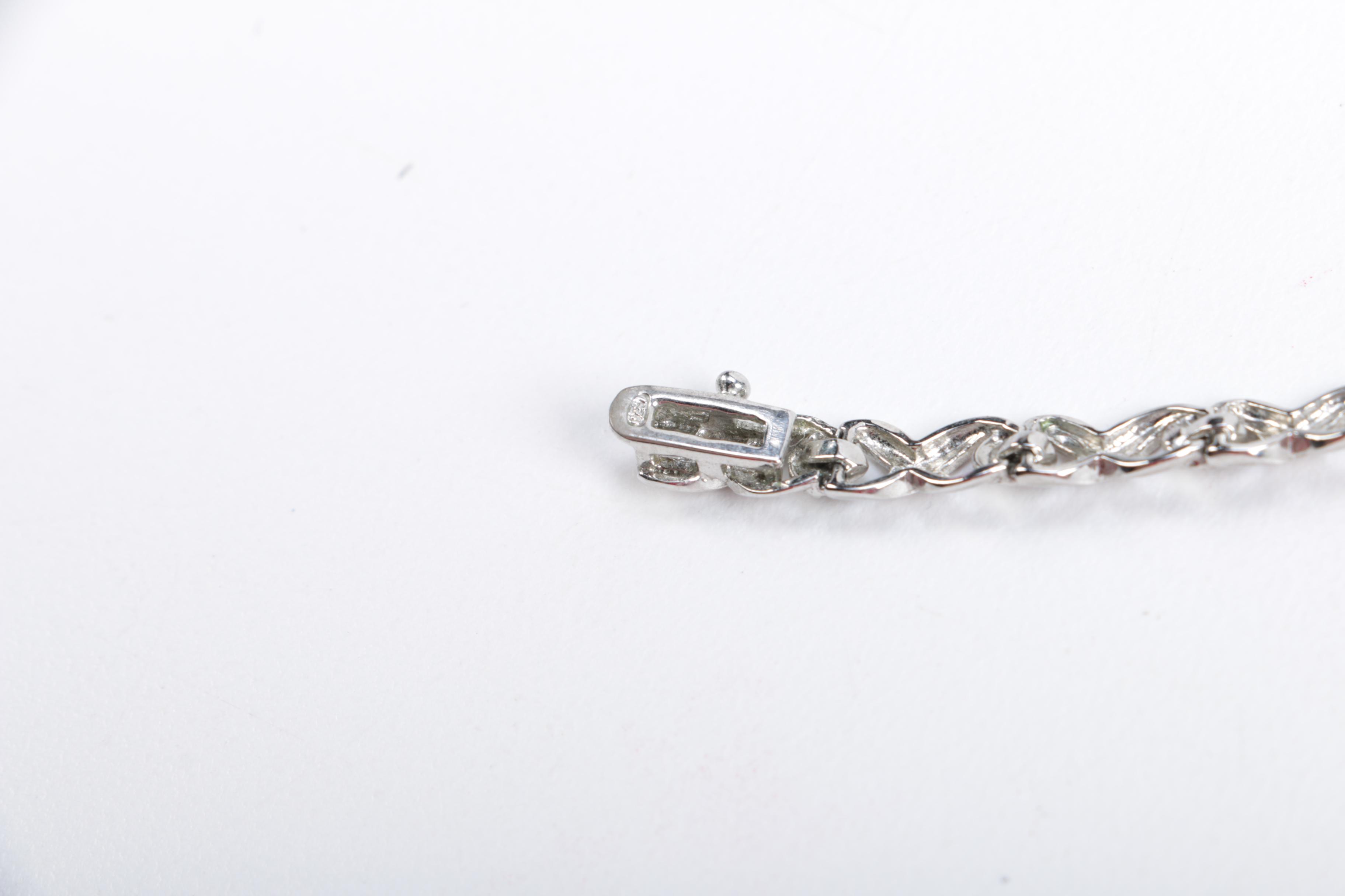 Bracelets Featuring Diamonds and Sterling Silver