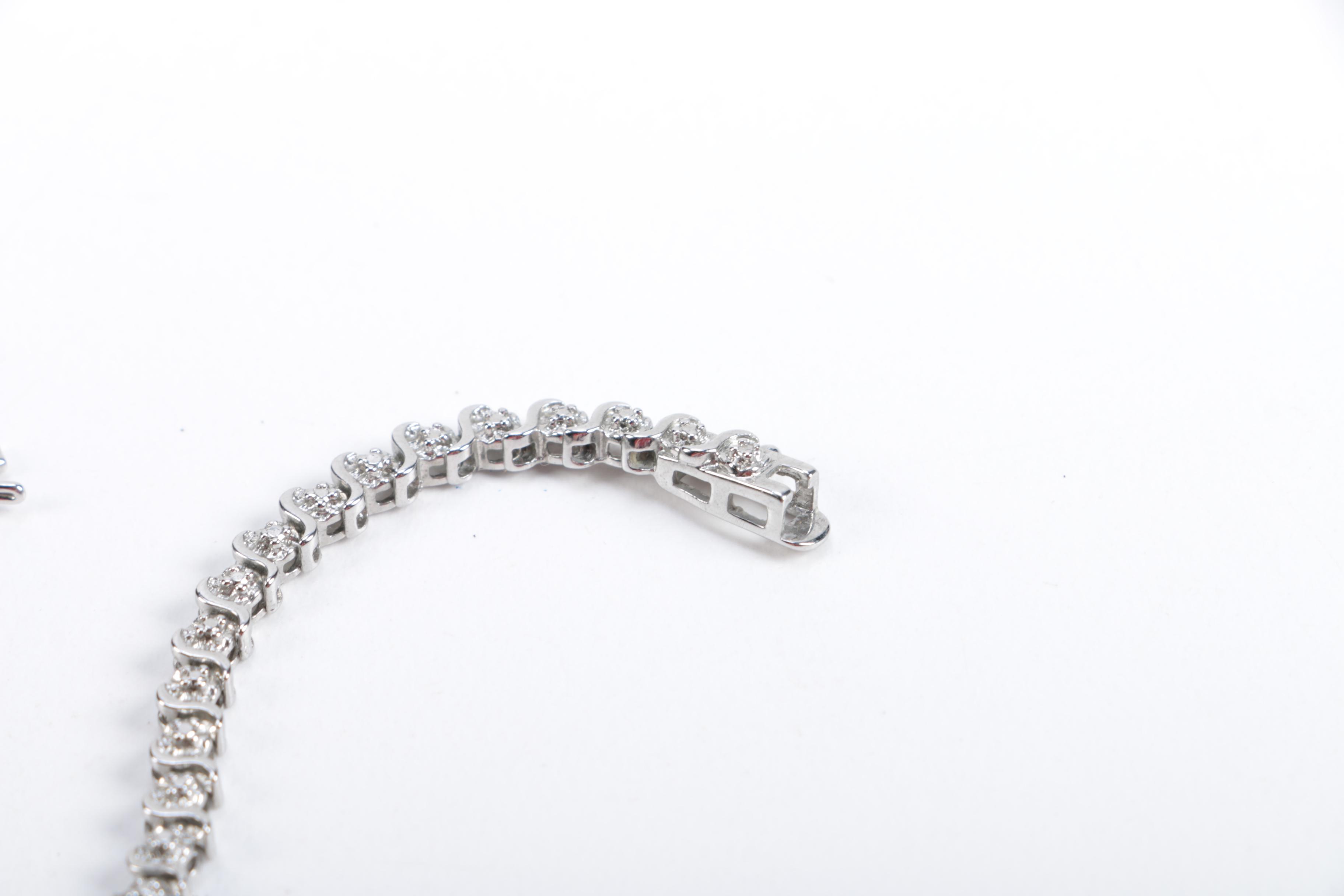 Bracelets Featuring Diamonds and Sterling Silver
