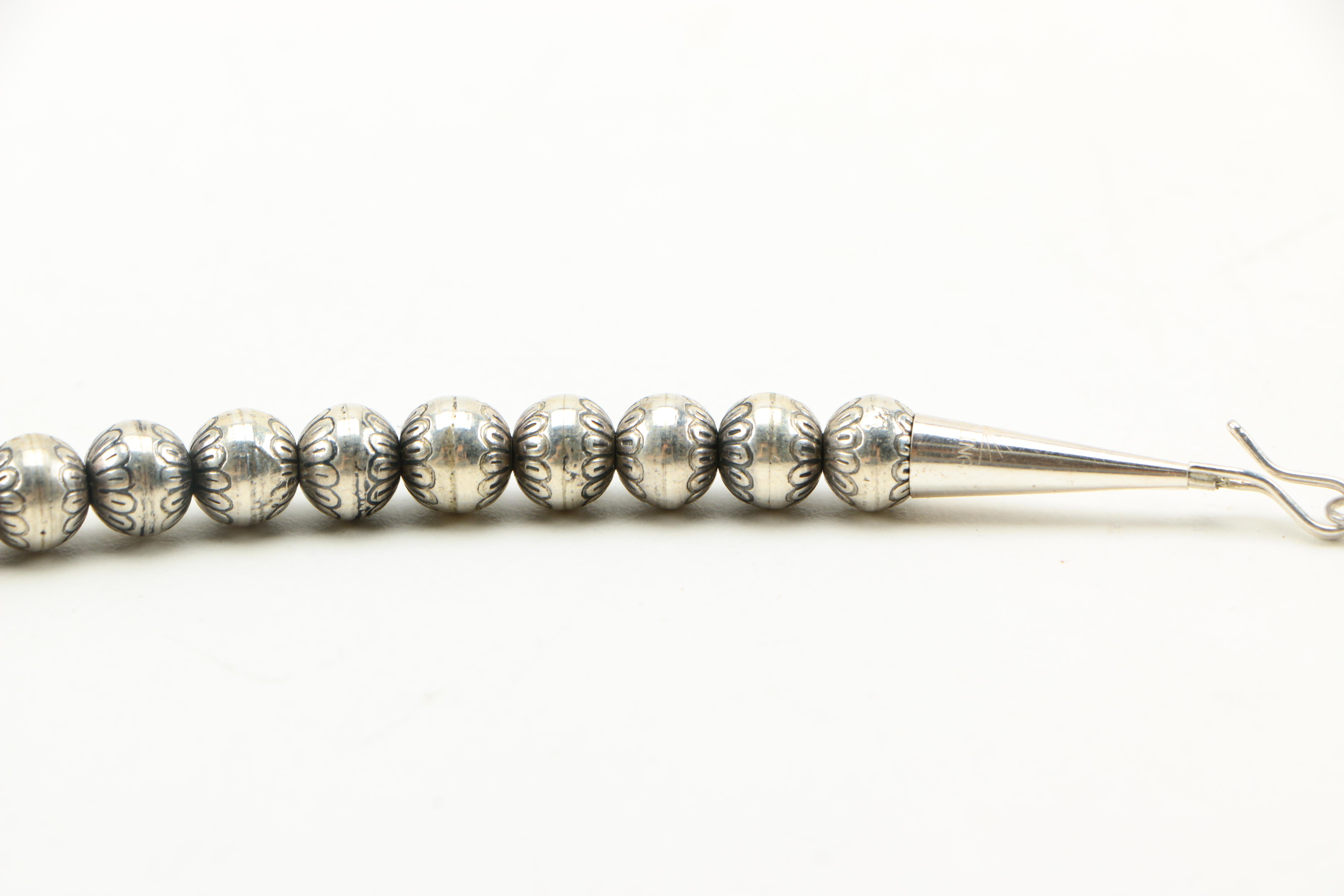 Sterling Silver Carved Ball Necklace