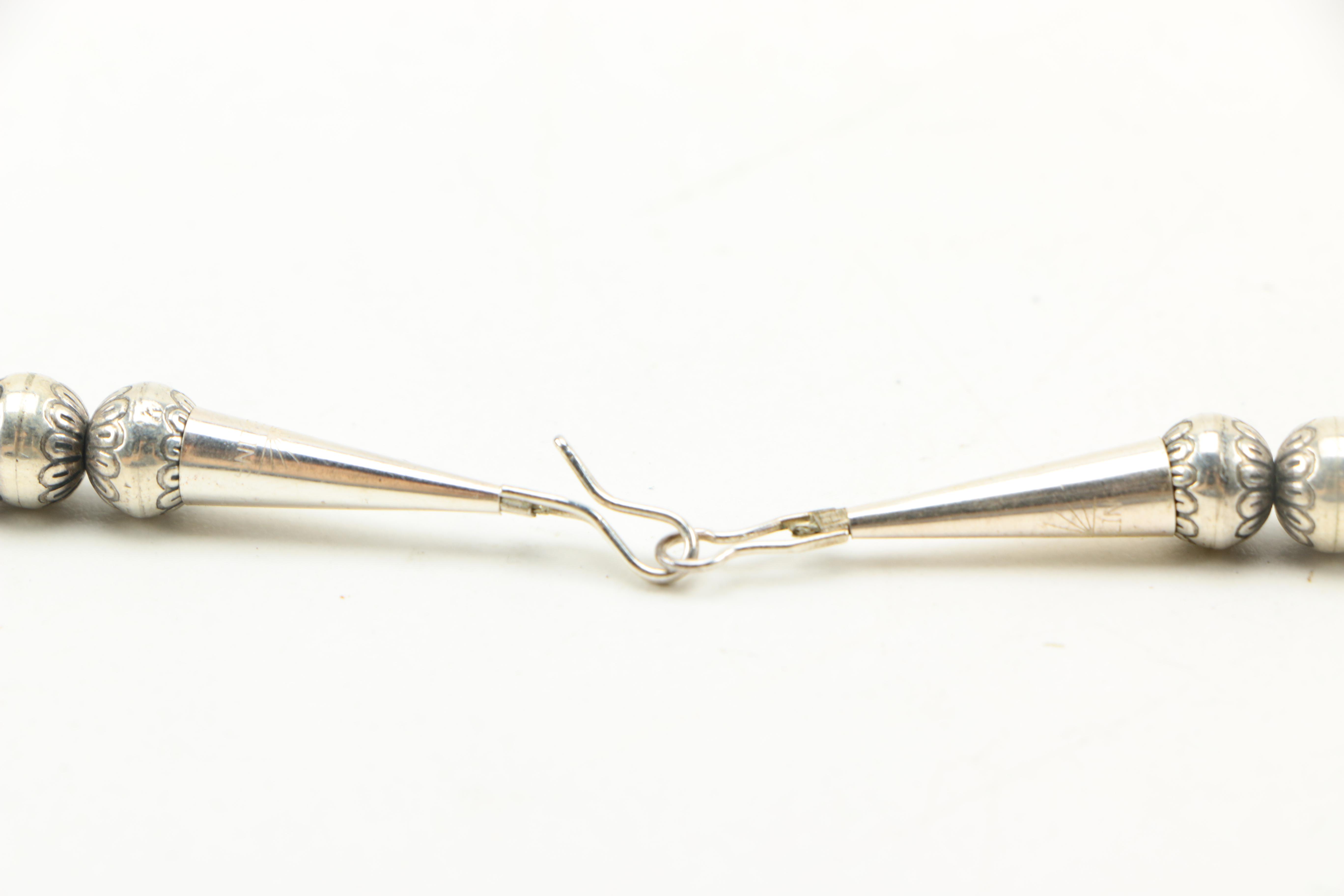 Sterling Silver Carved Ball Necklace