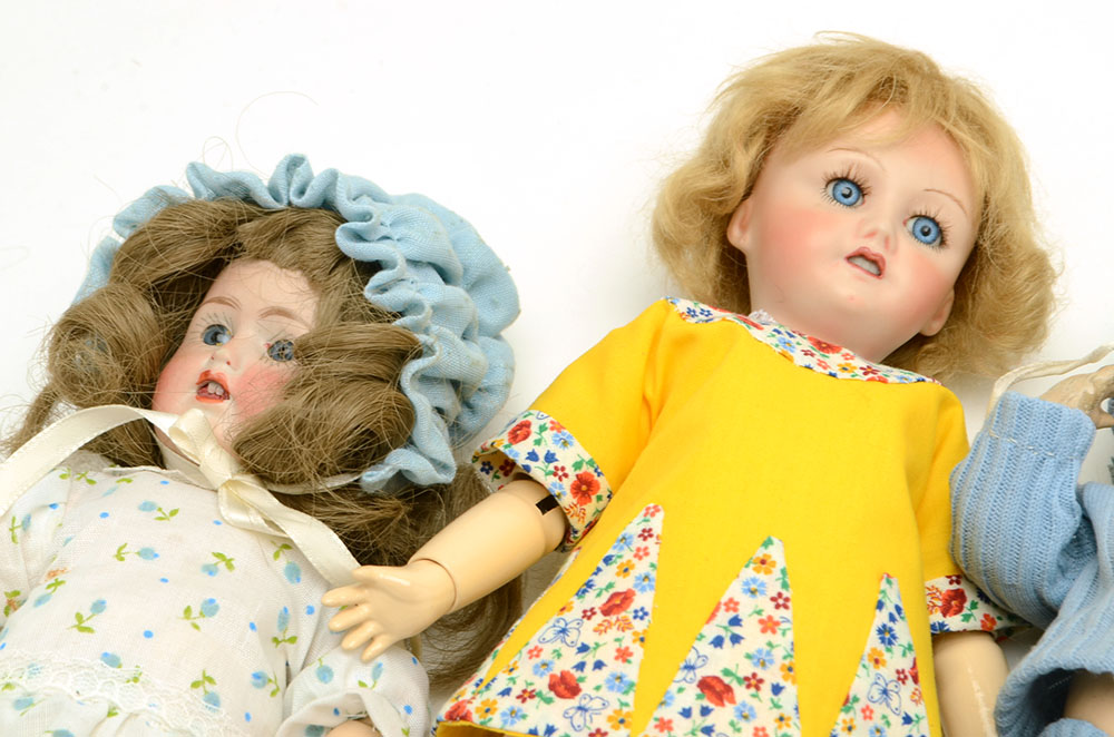 Collection of Porcelain Dolls some Antique