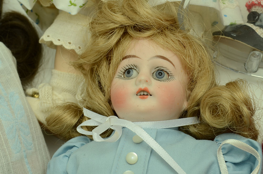 Collection of Porcelain Dolls some Antique