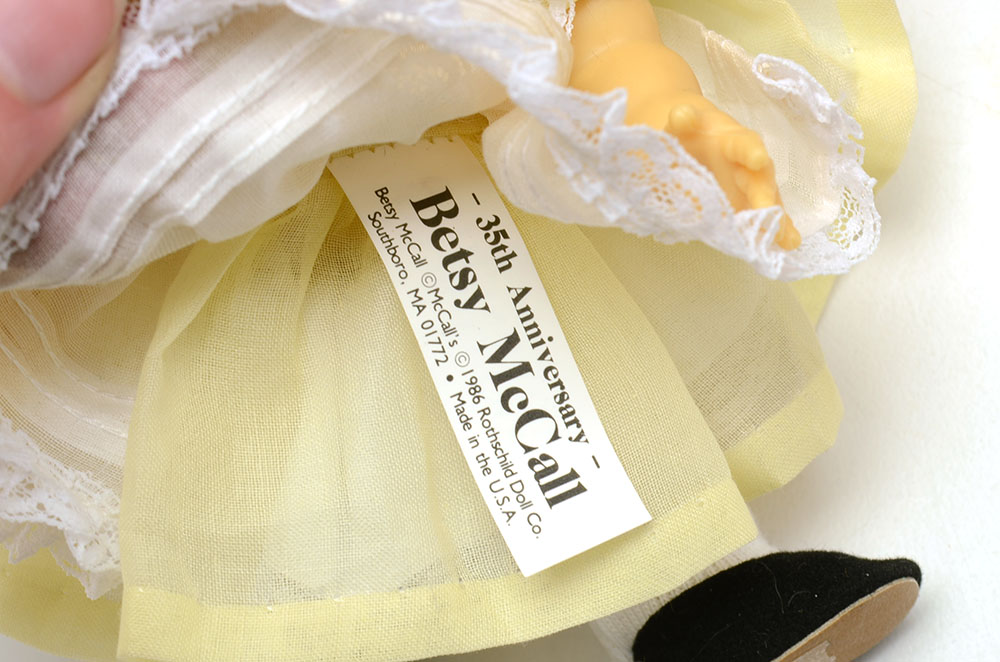 Group of Nine Collectable Dolls with Two Doll Cases