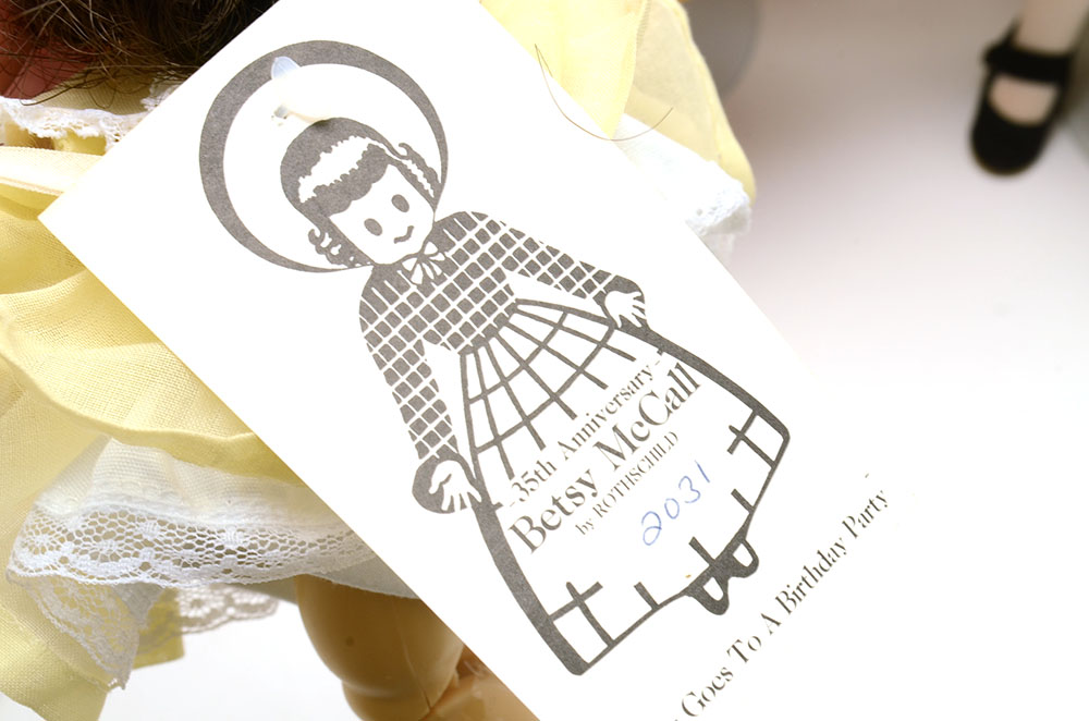 Group of Nine Collectable Dolls with Two Doll Cases